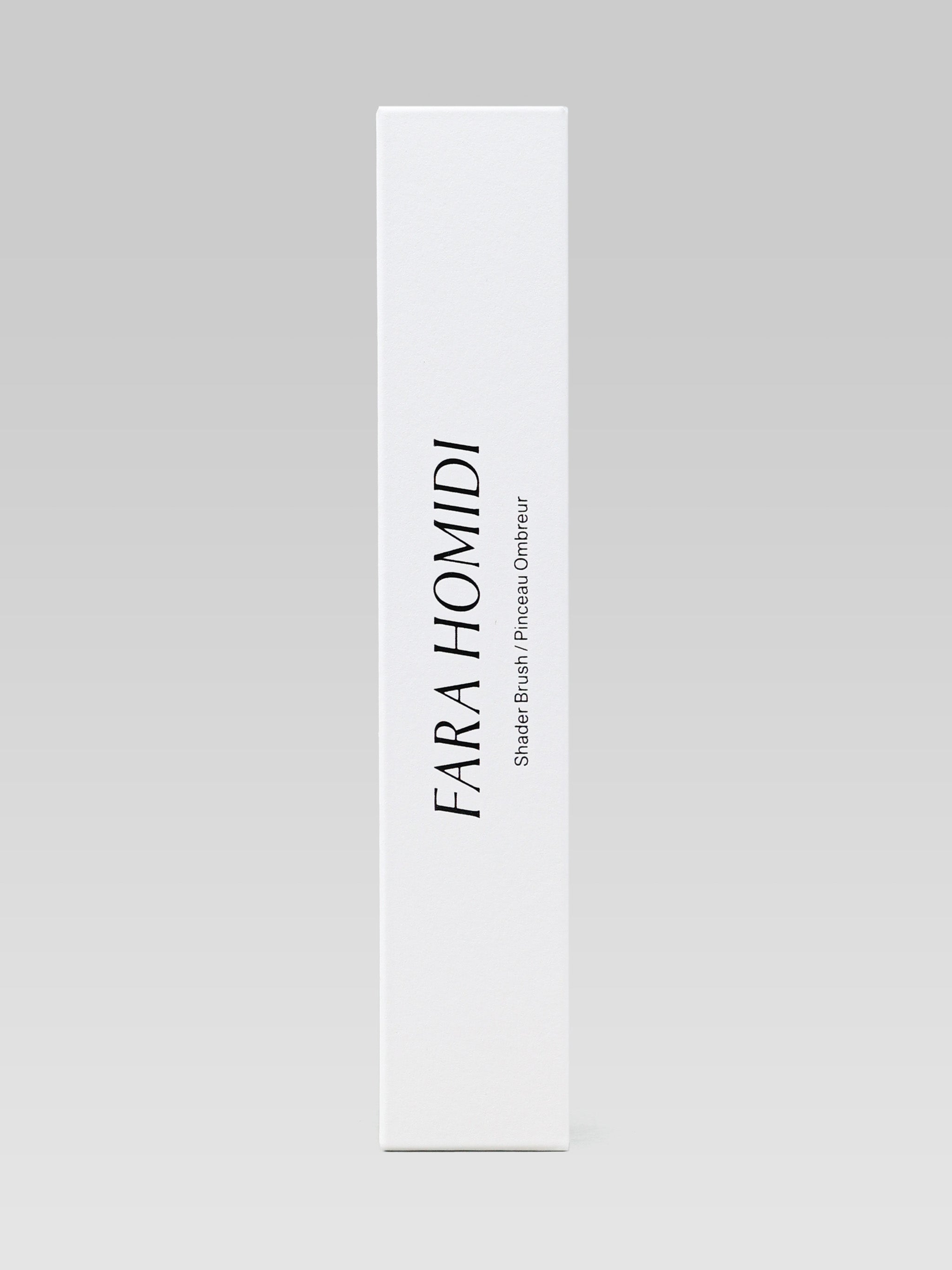 FARA HOMIDI Shader Brush white packaging on light gray background