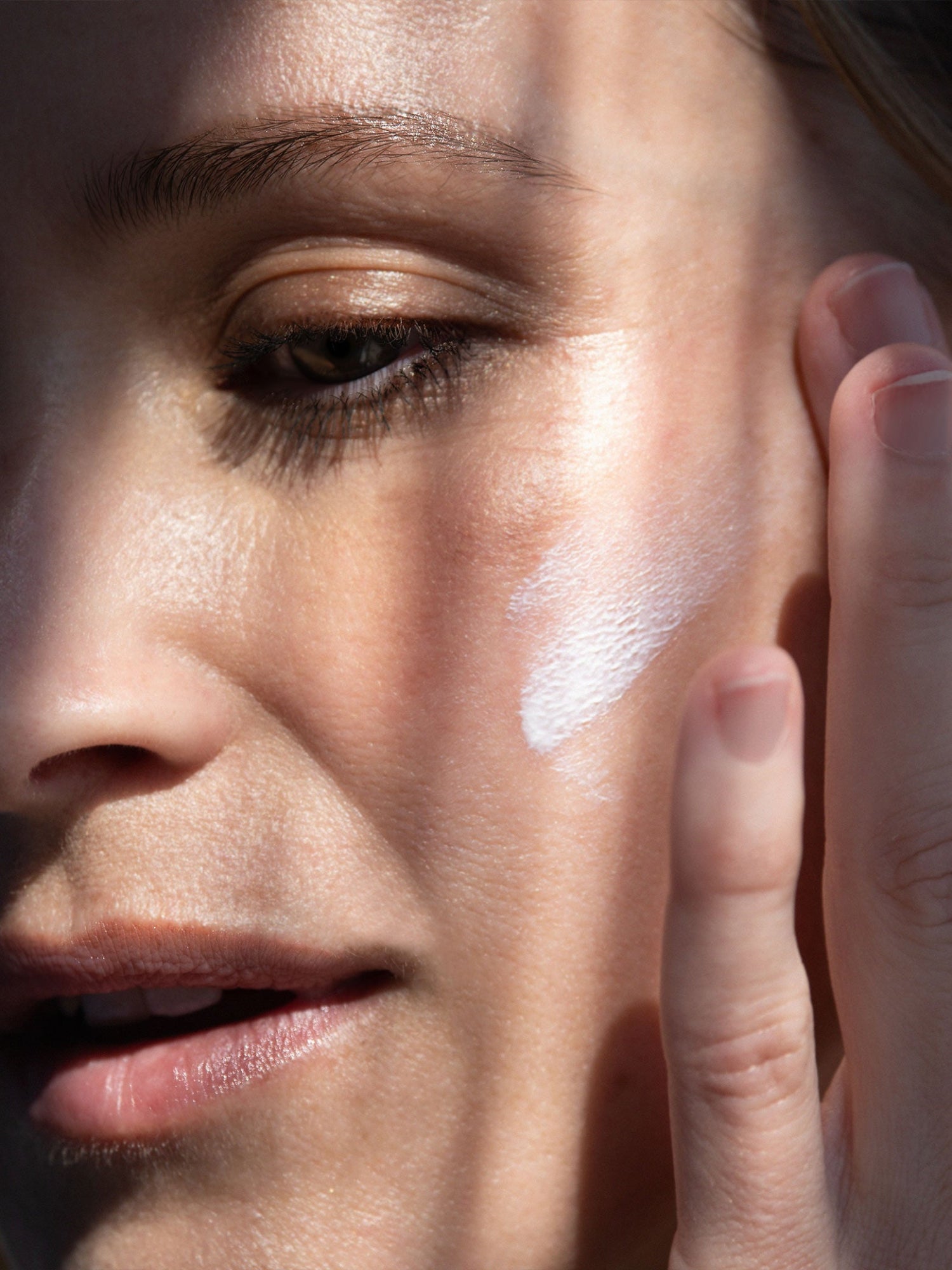 ODACITÉ Mineral Drops Sunscreen SPF 50 sheer application on face