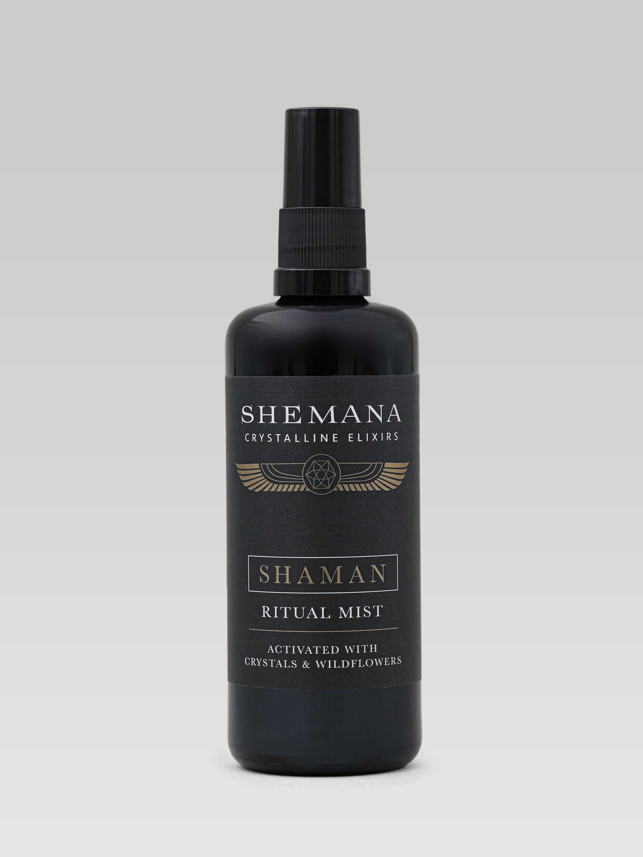 Shemana Shaman Ritual Mist product shot activated with crystals and wildflowers