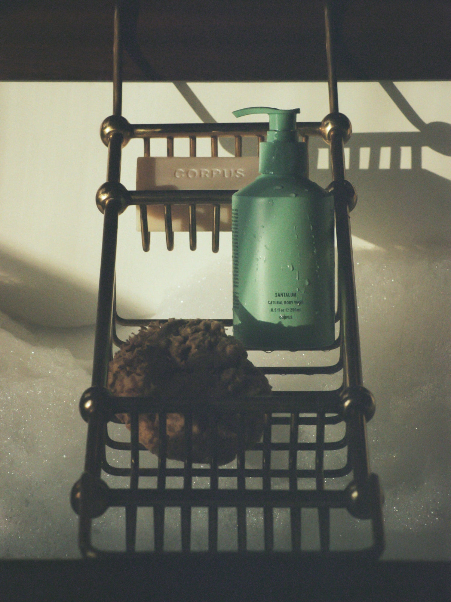 Corpus Body Wash bottle in bathroom shower setting