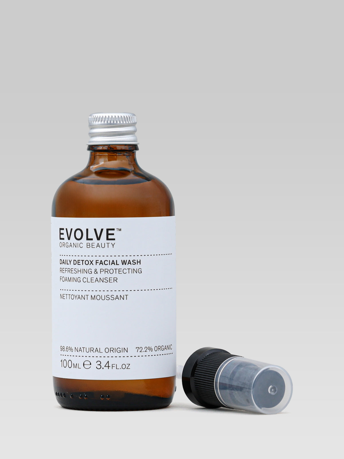 Evolve Organic Beauty Daily Detox Facial Wash foaming cleanser in amber glass bottle