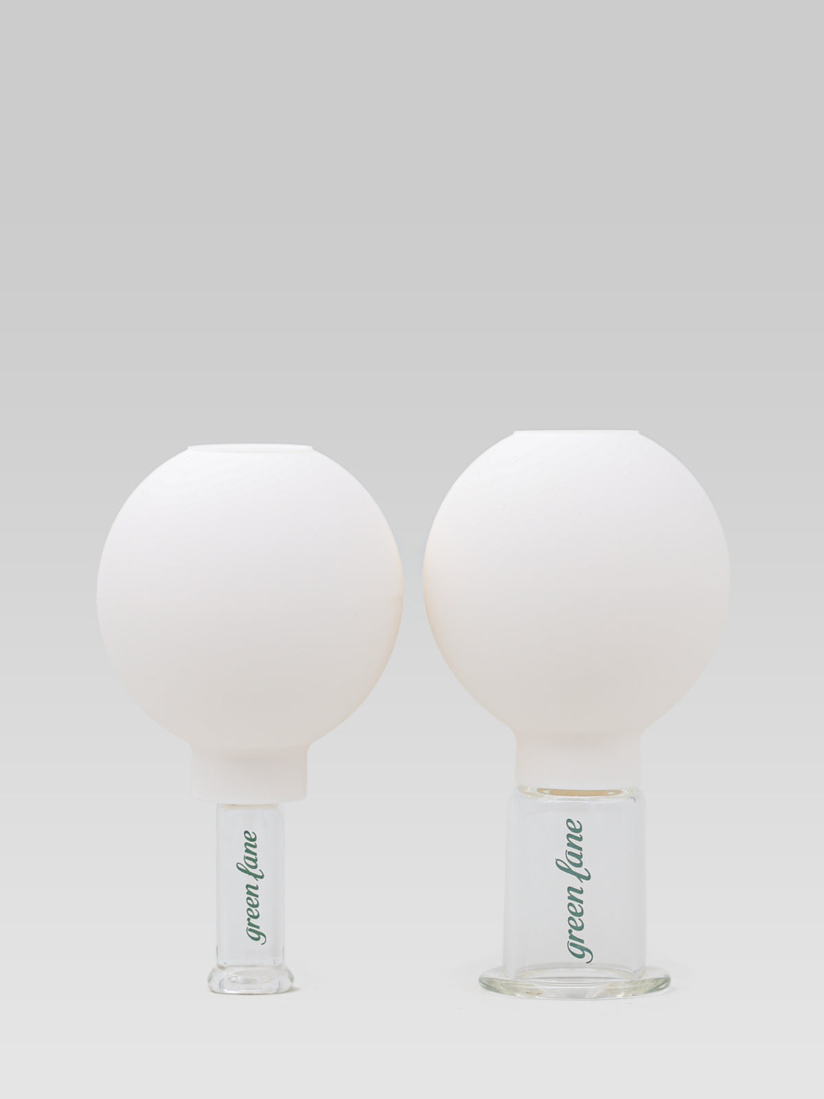 GREENLANE facial cupping set with two white facial massage cups for at-home skincare