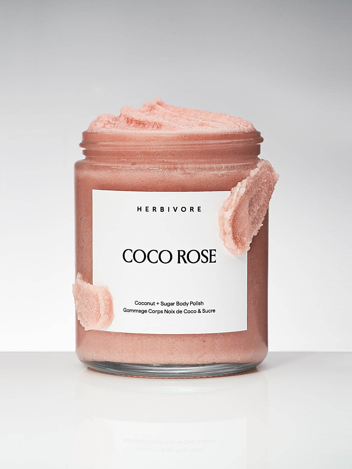 Herbivore Botanicals Coco Rose Coconut Oil Body Polish texture in jar