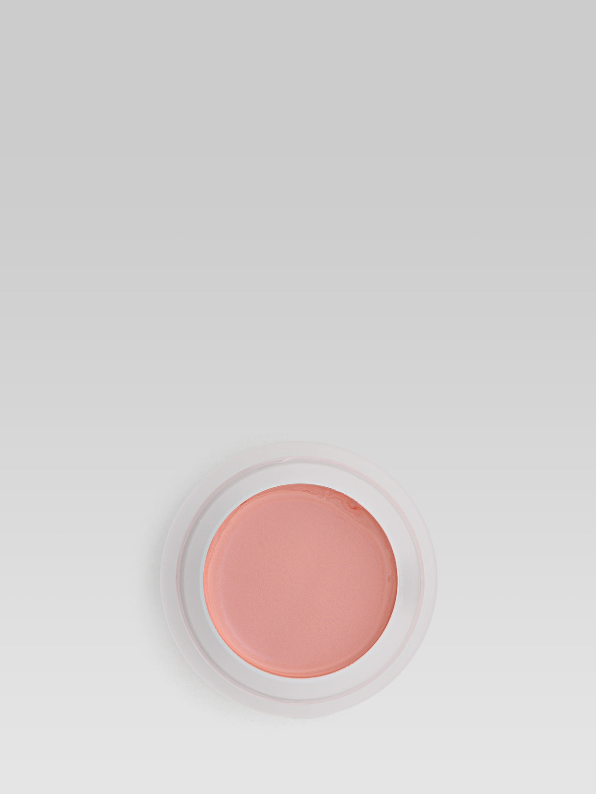 RMS Beauty Lip2Cheek in Spell, a soft peachy-pink cream blush in an open round pot on a light background
