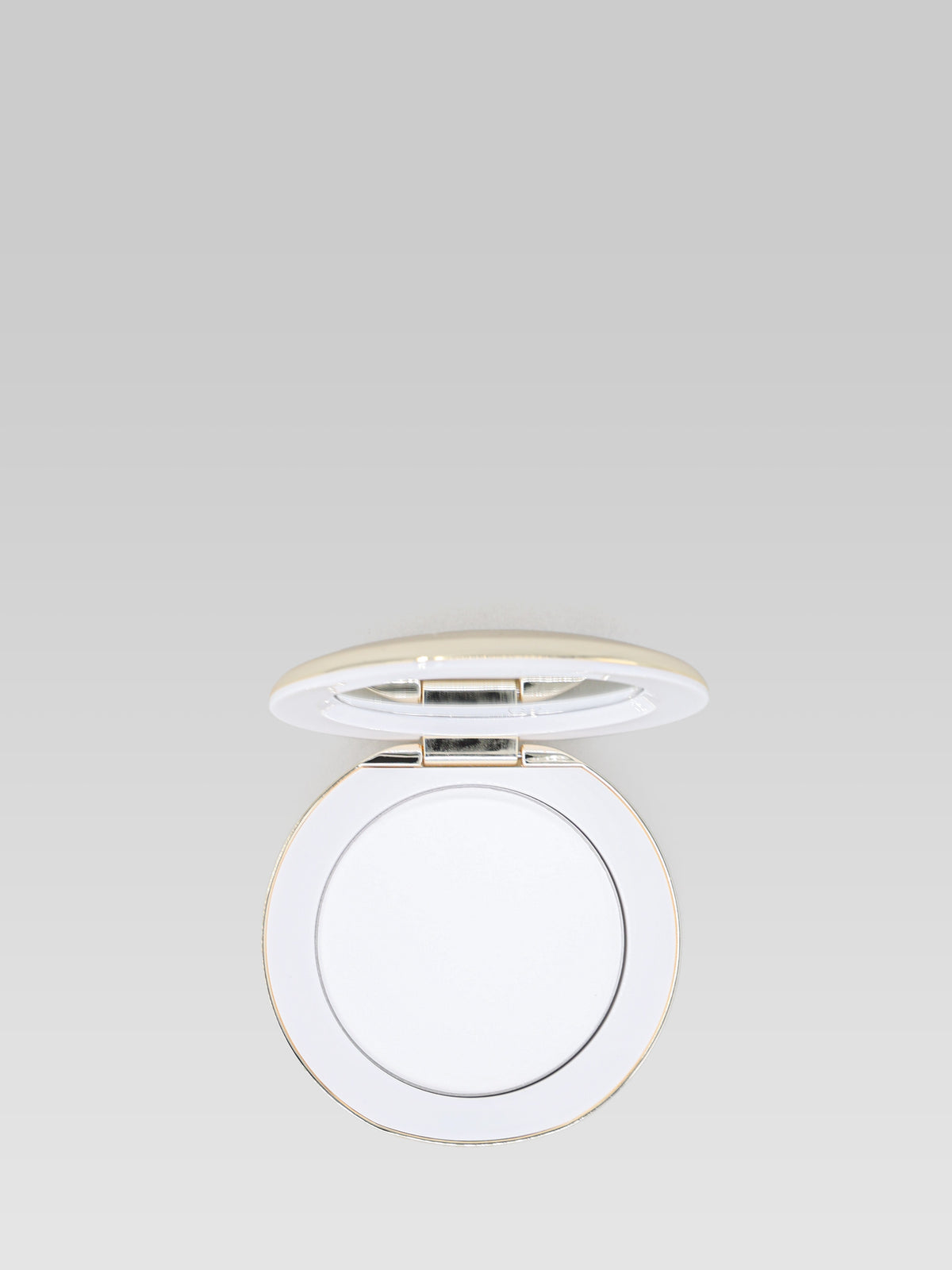 Westman Atelier Vital Pressed Skincare Face Powder in Translucent compact