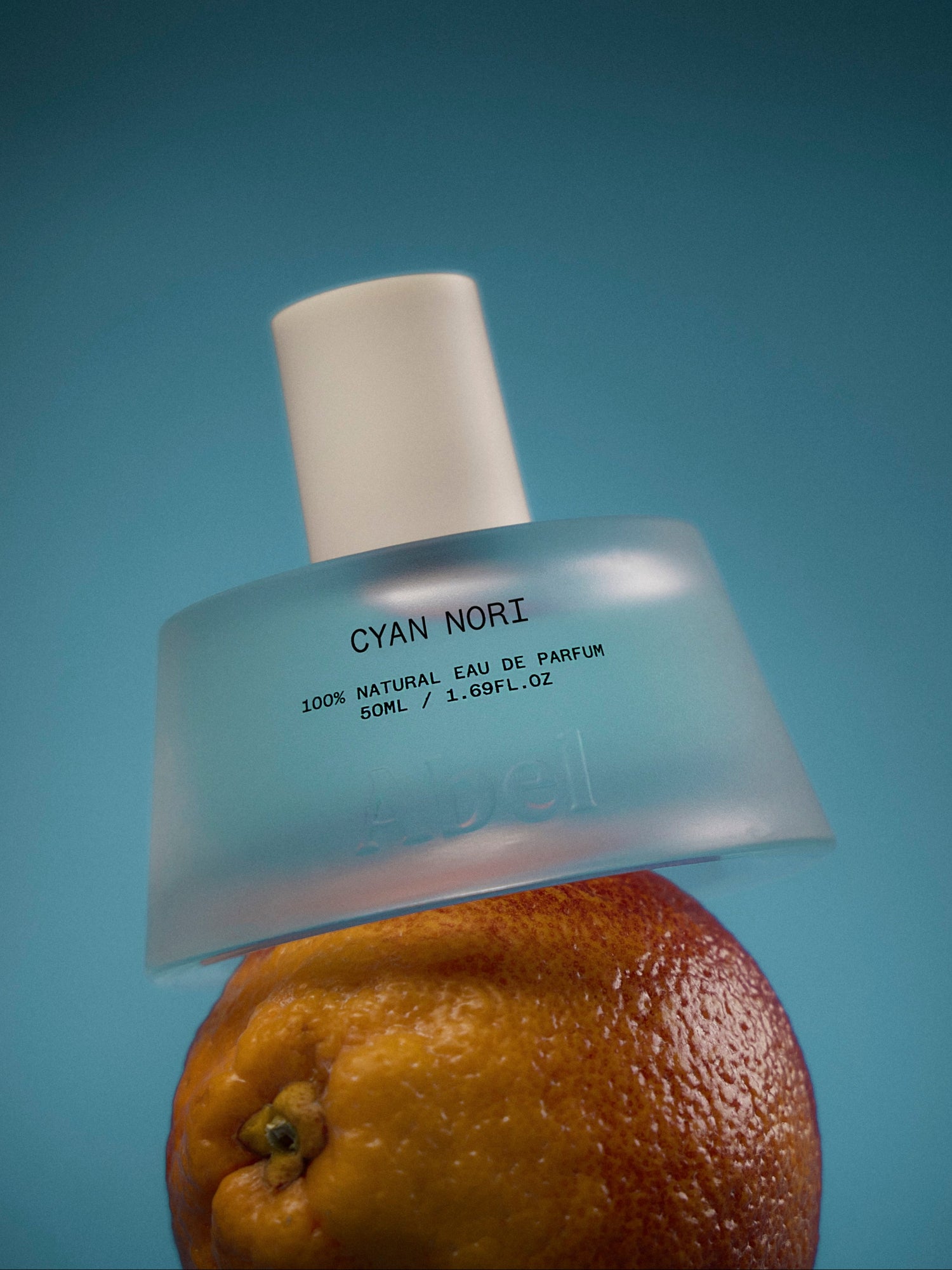 Abel Cyan Nori Eau de Parfum 50 ml bottle displayed on an orange