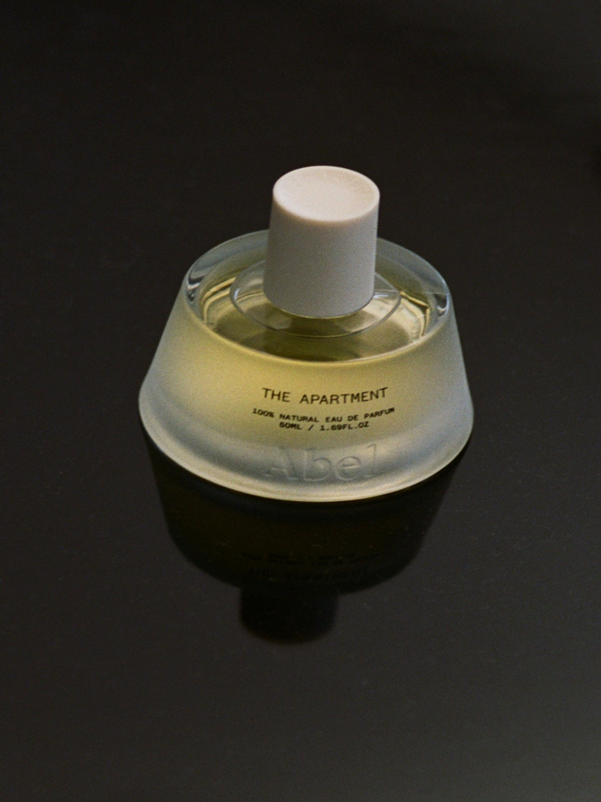 ABEL The Apartment 50 ml 100% Natural Eau de Parfum bottle on dark reflective surface