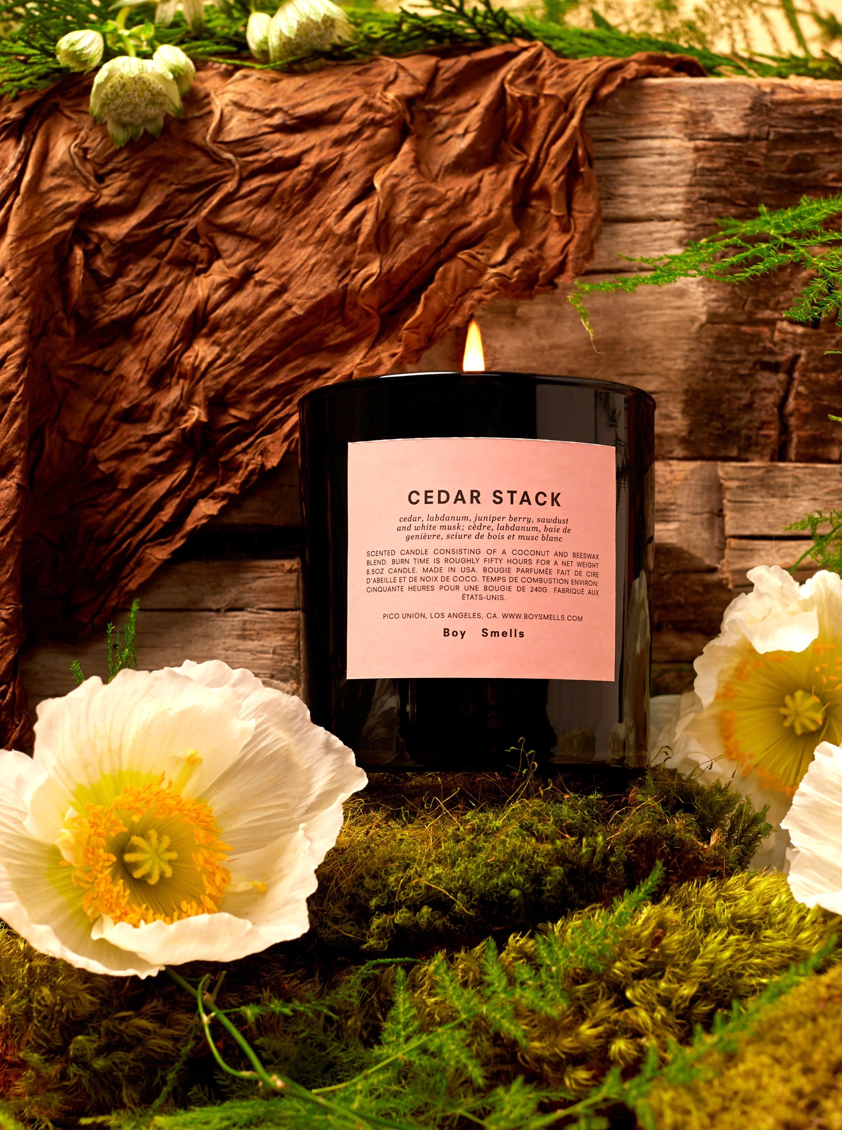 Boy Smells Candle Cedar Stack Lifestyle Picture