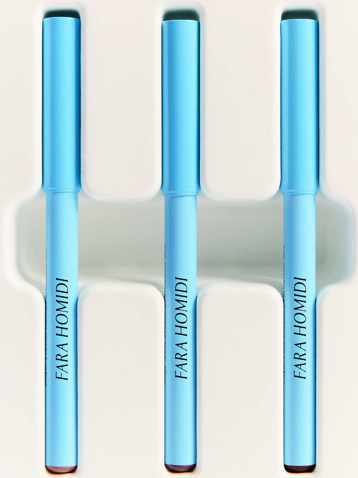 FARA HOMIDI Essential Lip Contour Trio Closeup three lipliners in box