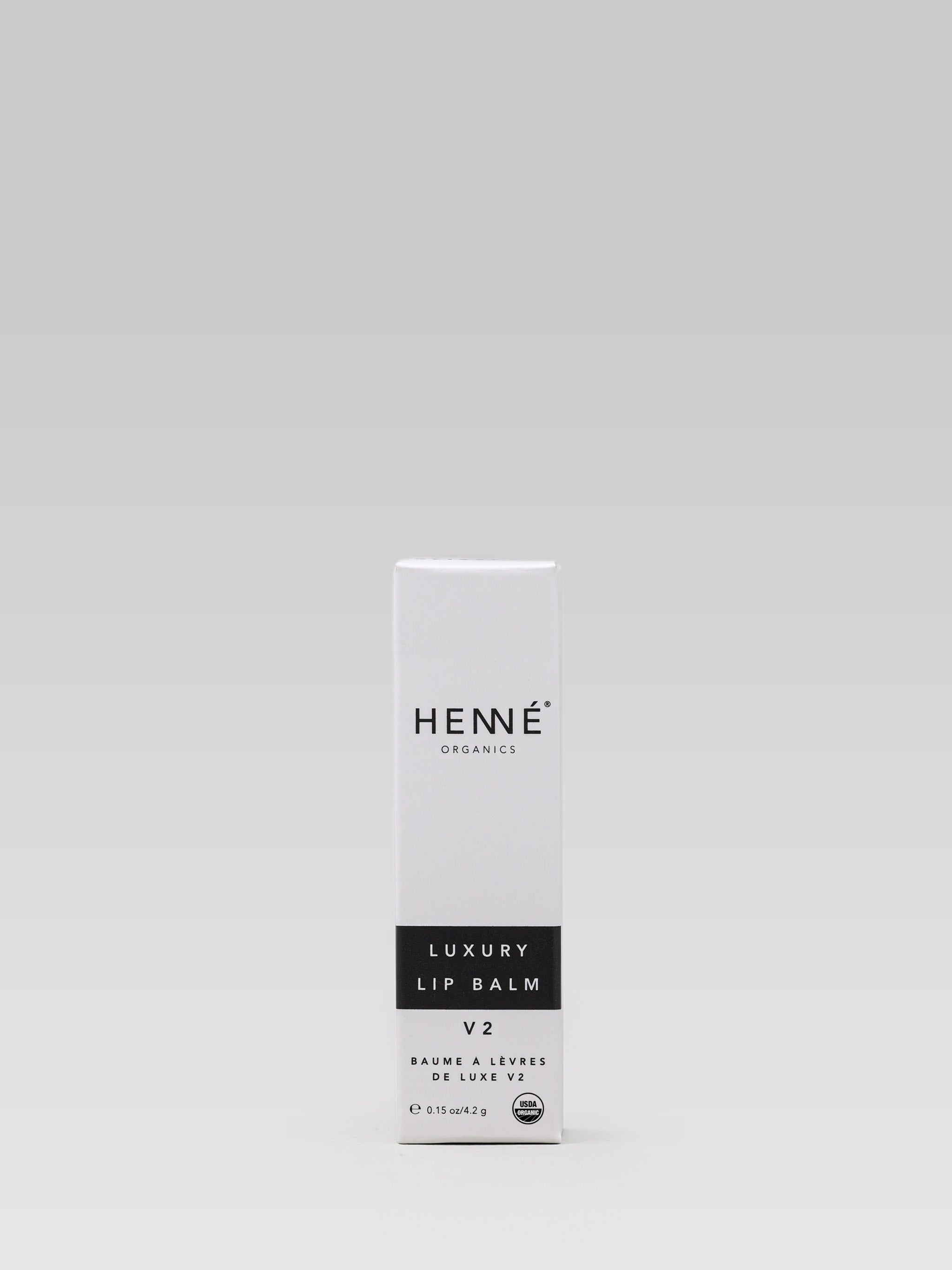 Henne Organics Luxury Lip Balm V2 product packaging 