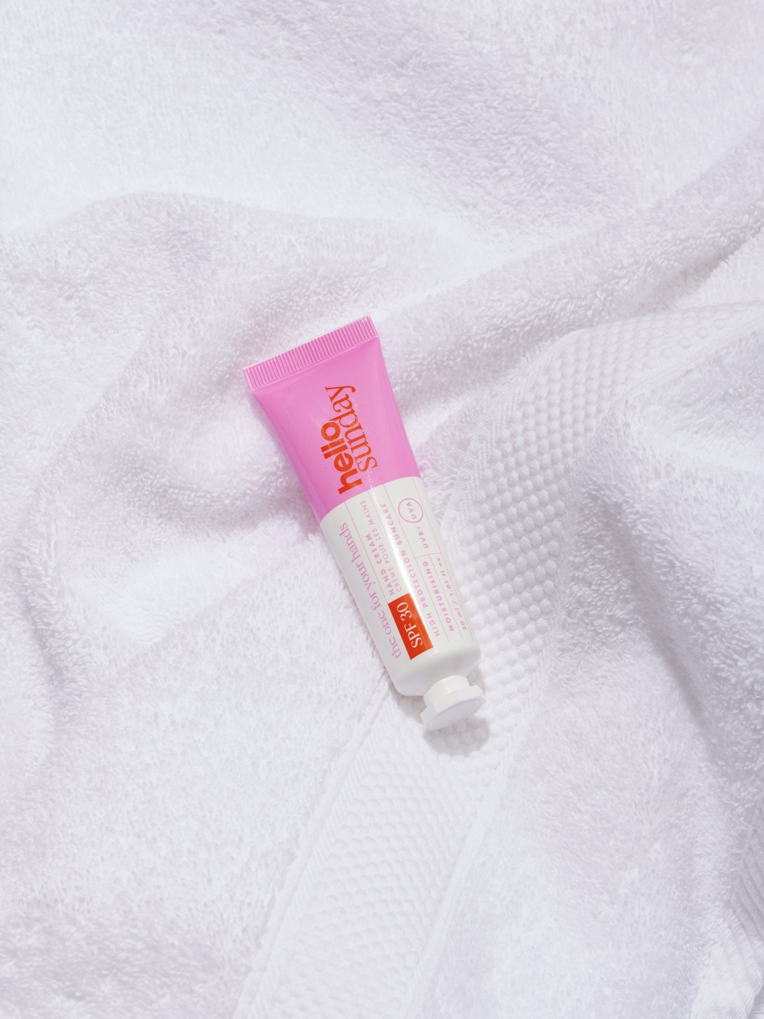 HELLO SUNDAY The One for Your Hands hand cream on white towel