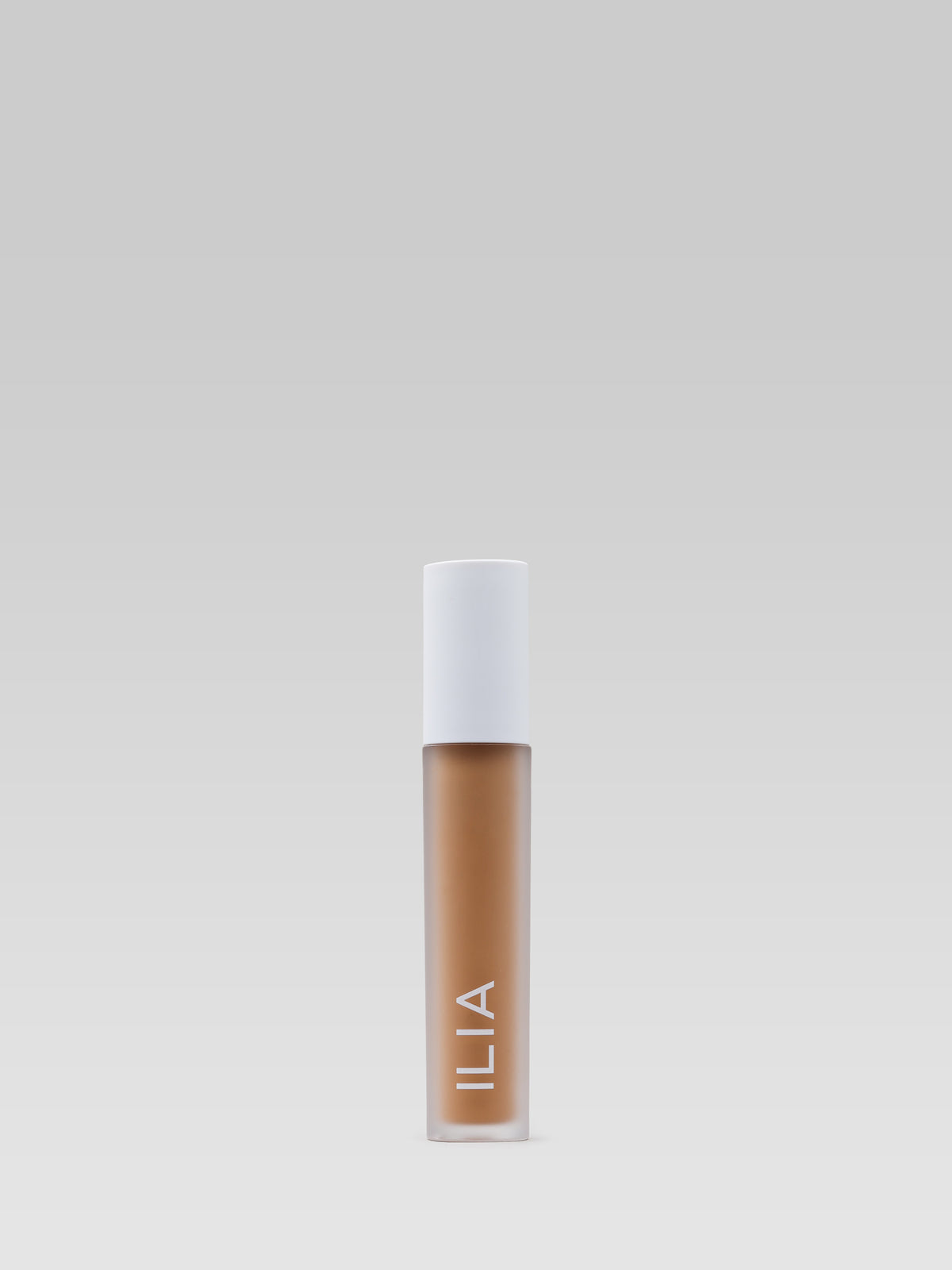 ILIA Beauty Skin Blur Concealer in shade 240 Percale, a liquid concealer in a slim tube with a white cap and warm beige formula, shown against a neutral background.