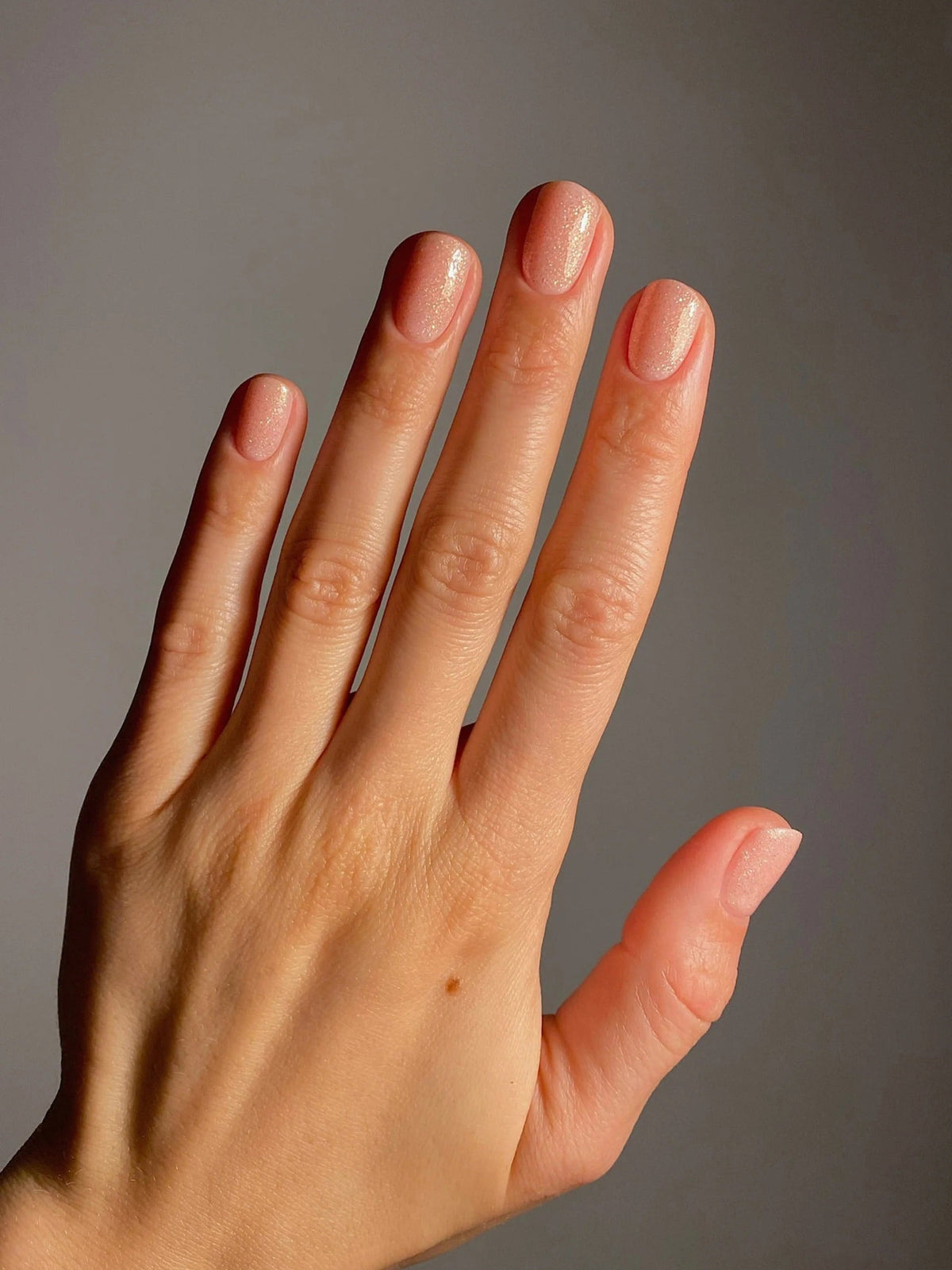 KAROLIN VAN LOON Crushed Crystals iridescent glitter nail polish on nails