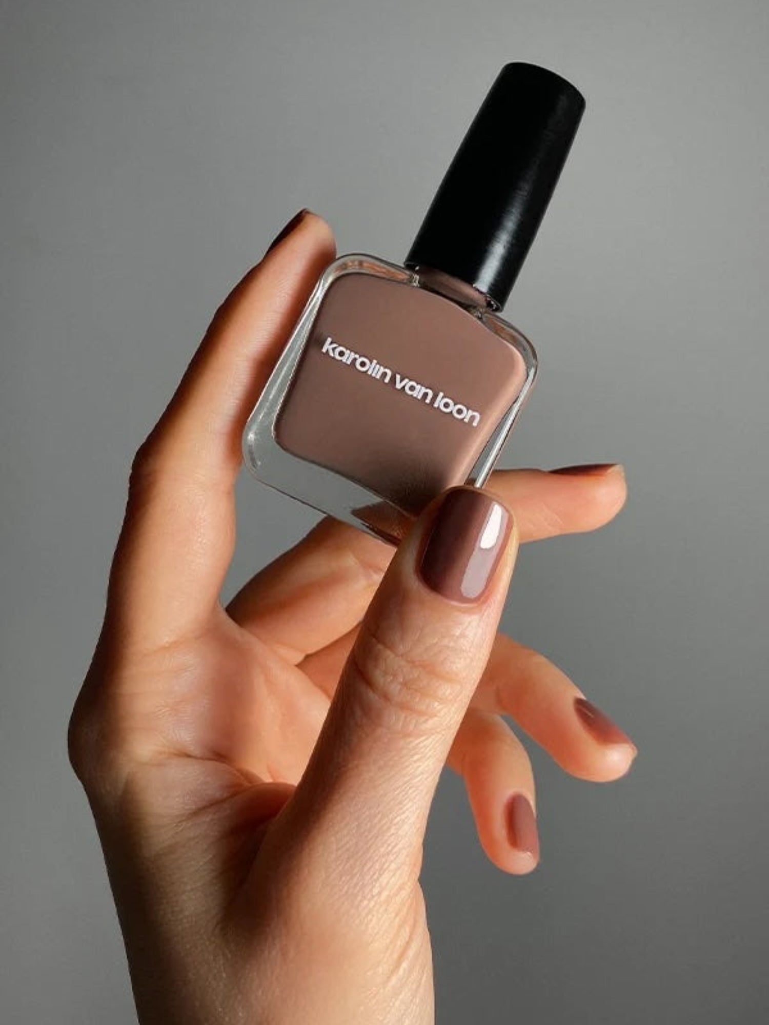 KAROLIN VAN LOON Fleur de Bois brown nail polish on nails