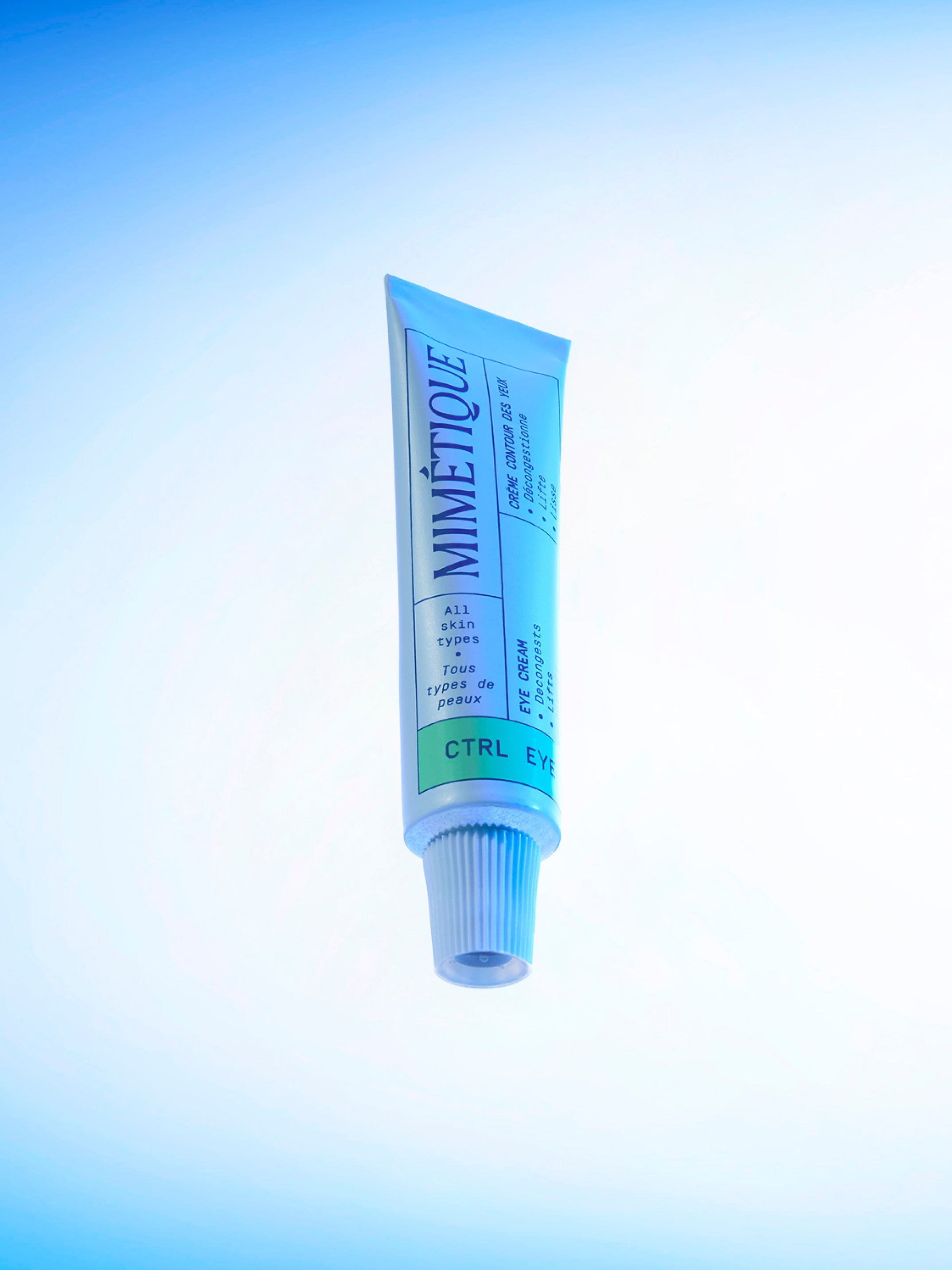 A tube of MIMÉTIQUE Ctrl Eye Smoothing Eye Cream shot from below