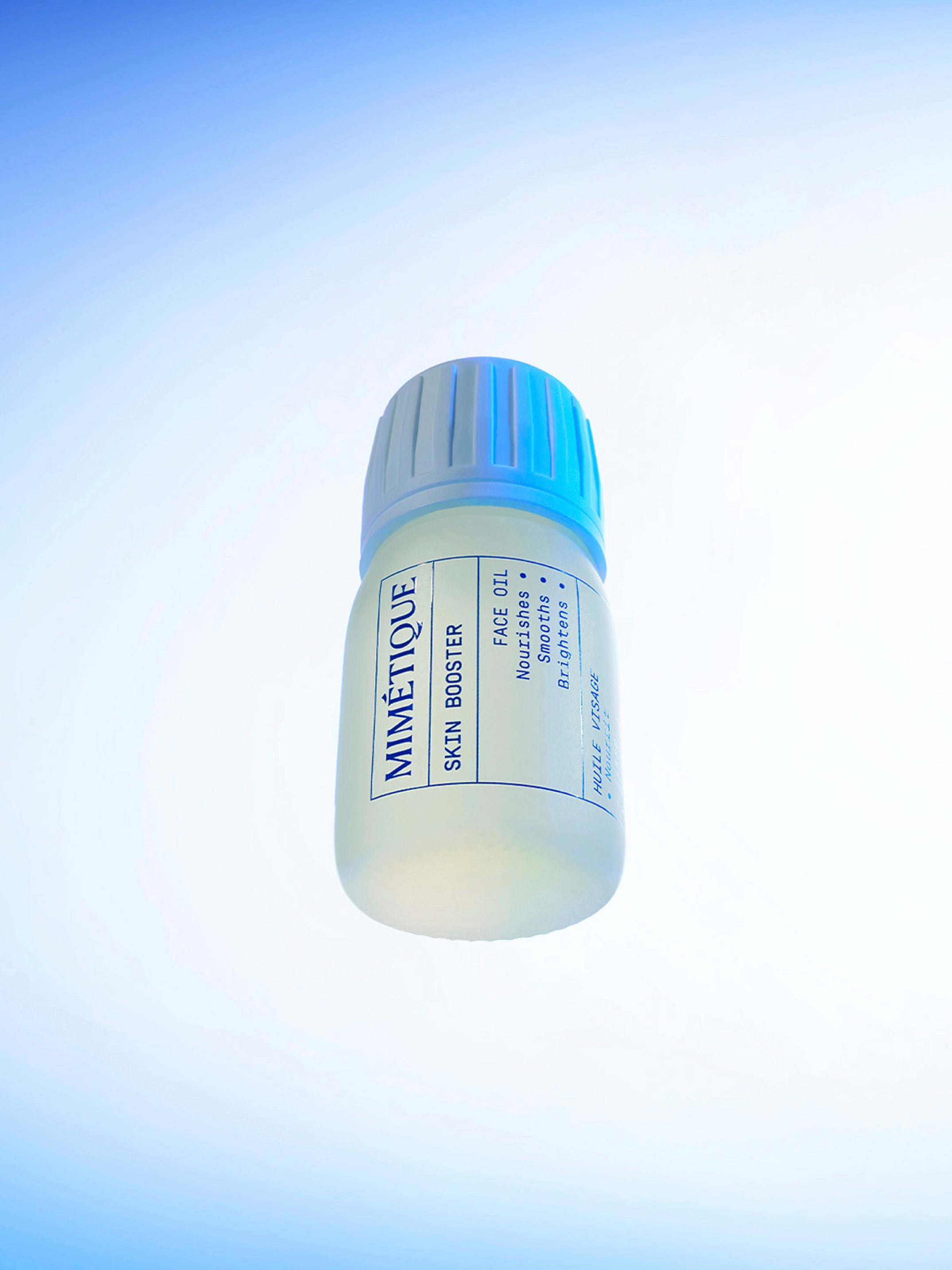 Bottle of MIMÉTIQUE Skin Booster Radiance Face Oil shot from below
