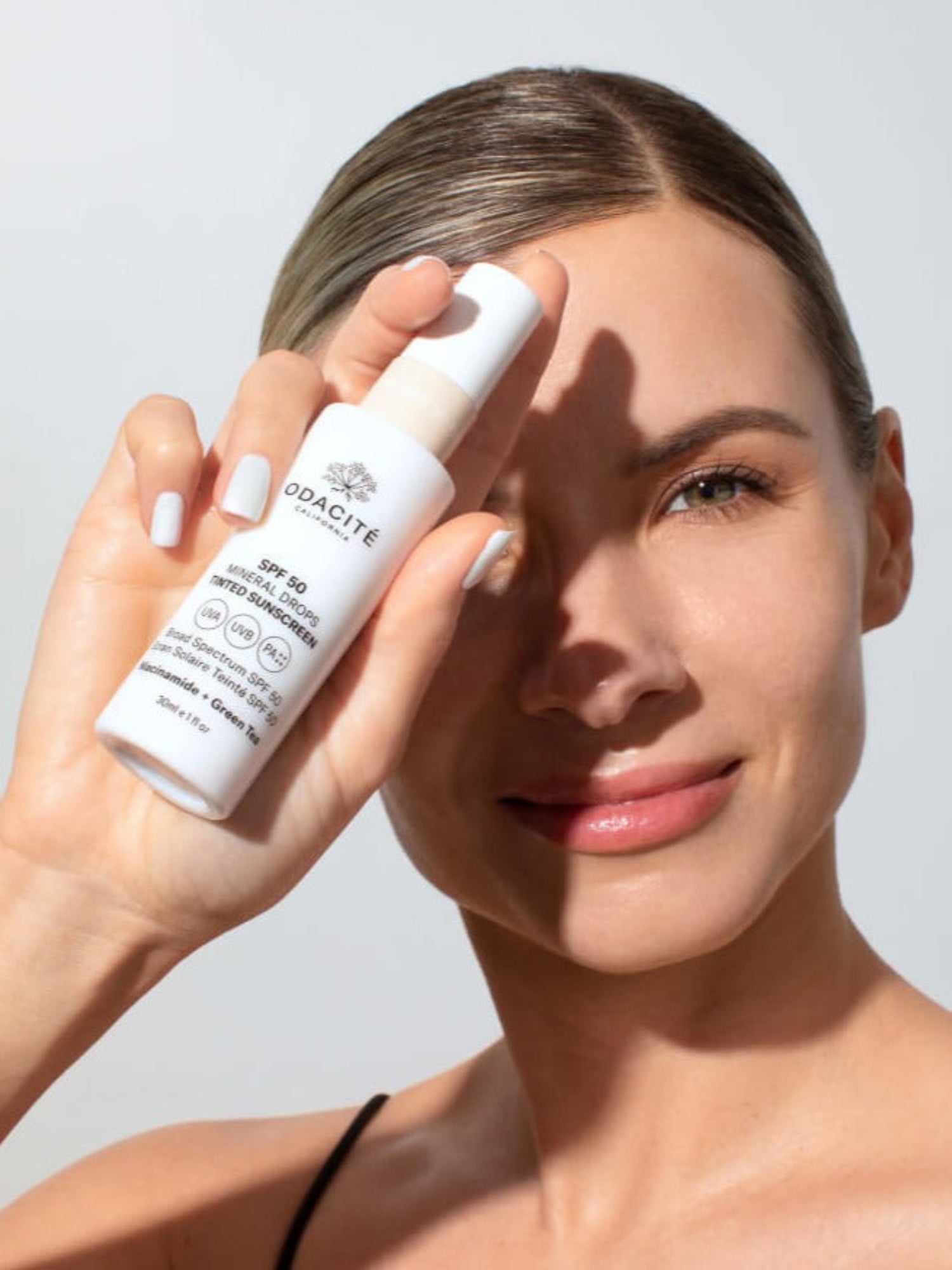 ODACITÉ Mineral Drops Tinted Sunscreen SPF 50 Shade 02 Model Image