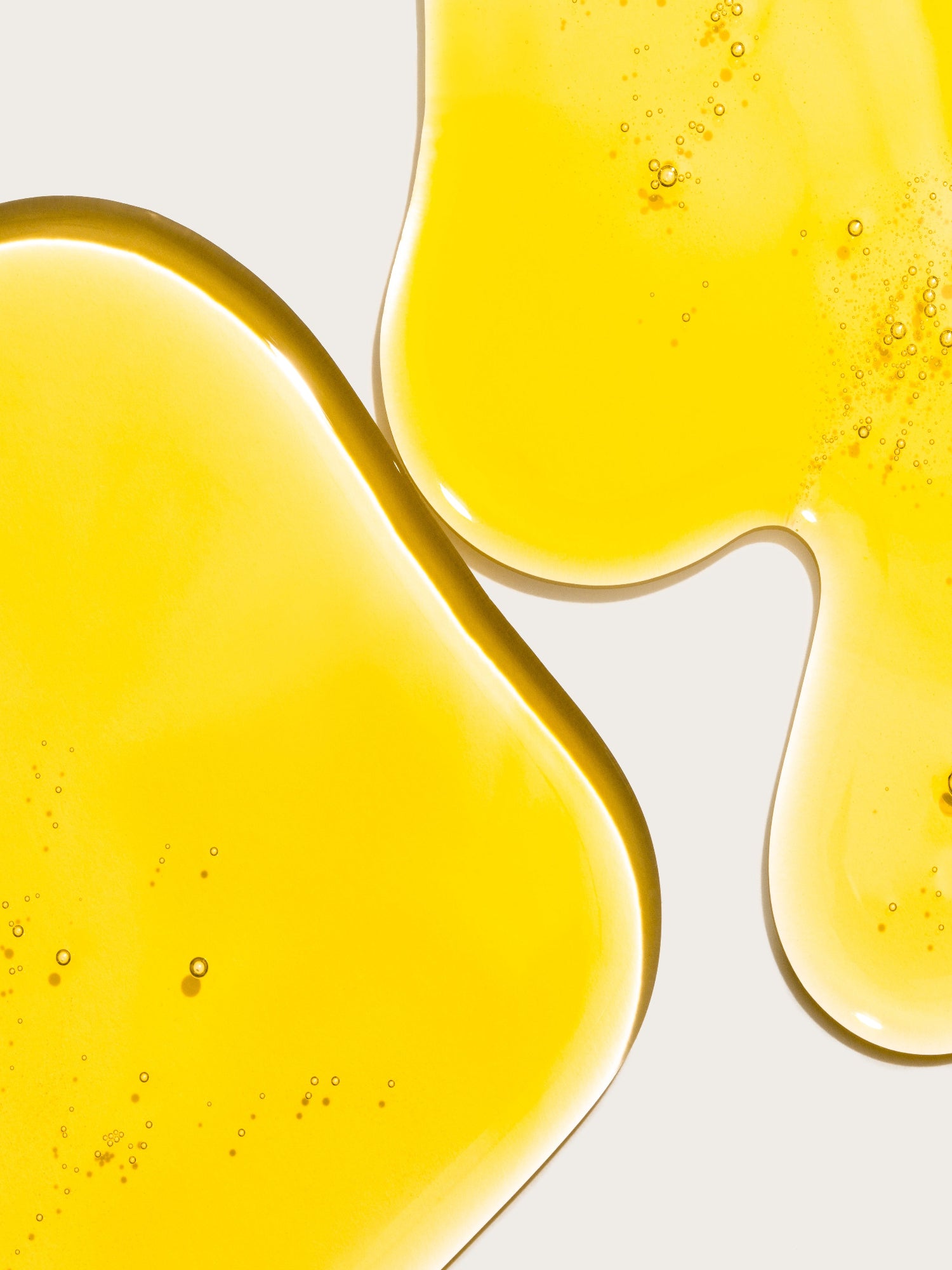 ODACITÉ C-Glow Hydra-Firm Body Oil texture close-up
