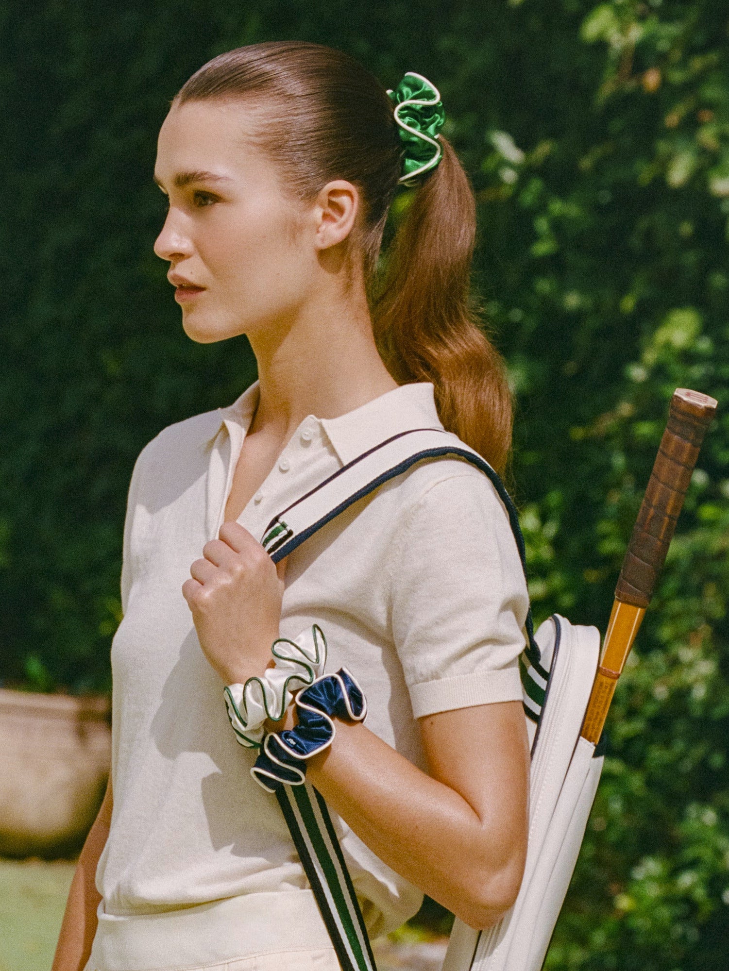 SLIP Game Day Large Scrunchies – woman wearing a green silk scrunchie in her hair