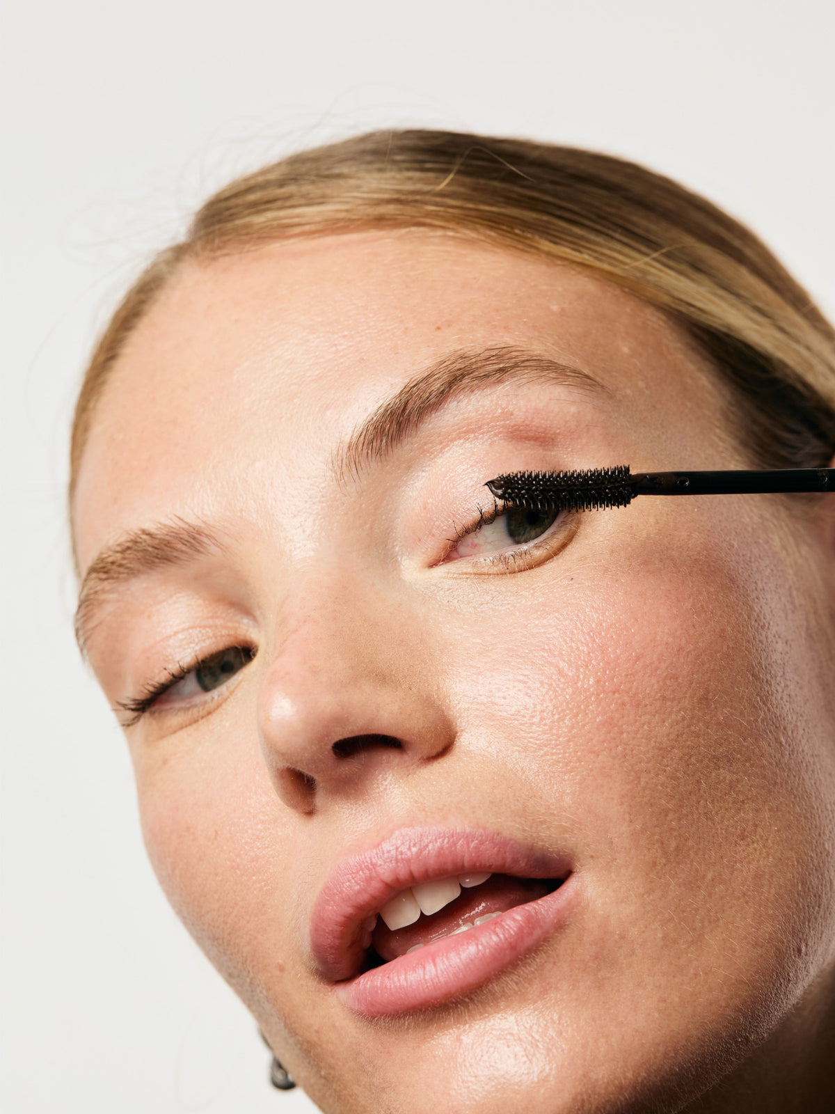 AIME The Definition Mascara applied to eyelashes