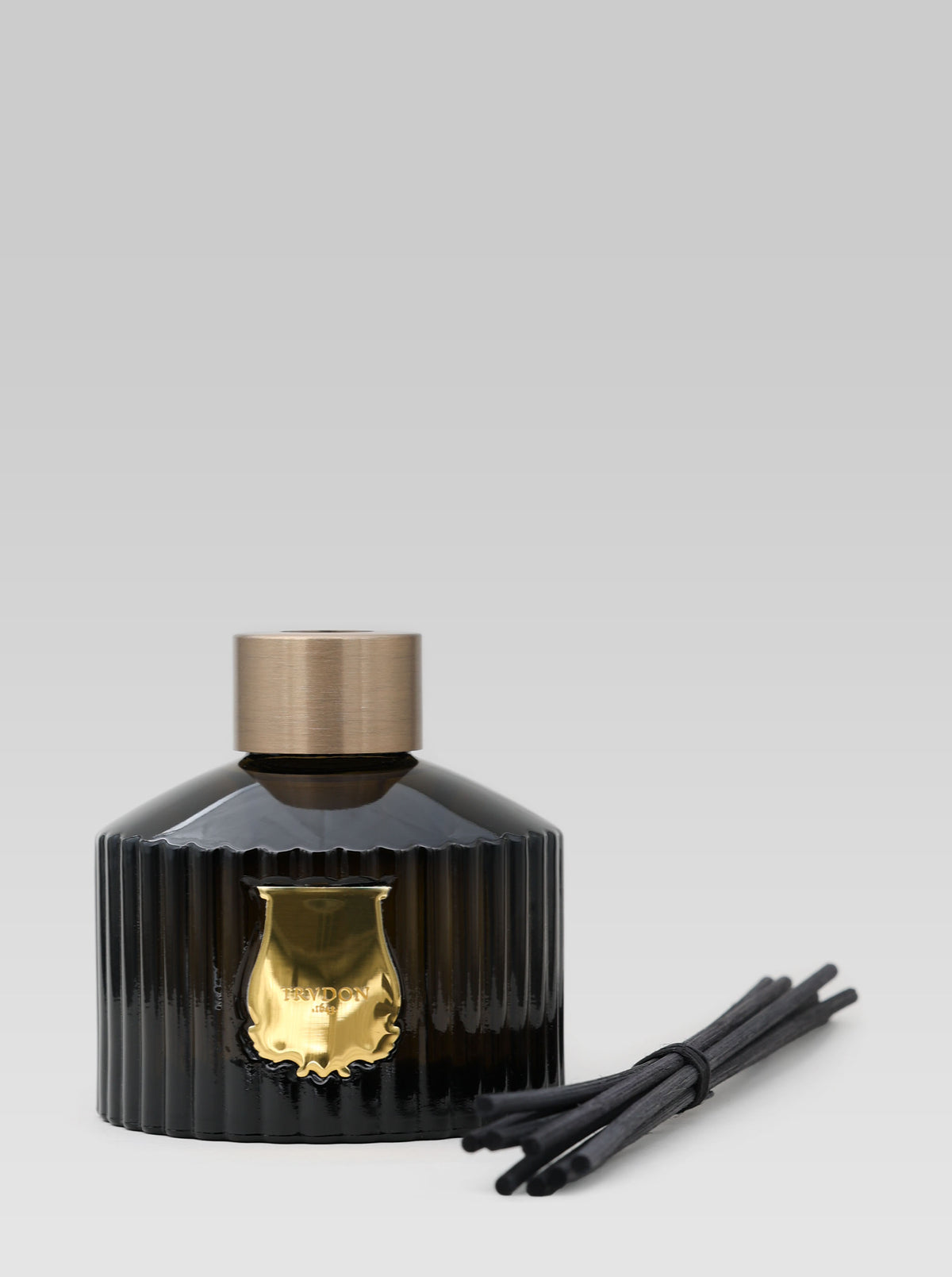 Cire Trudon Cyrnos reed diffuser with black fragrance reeds