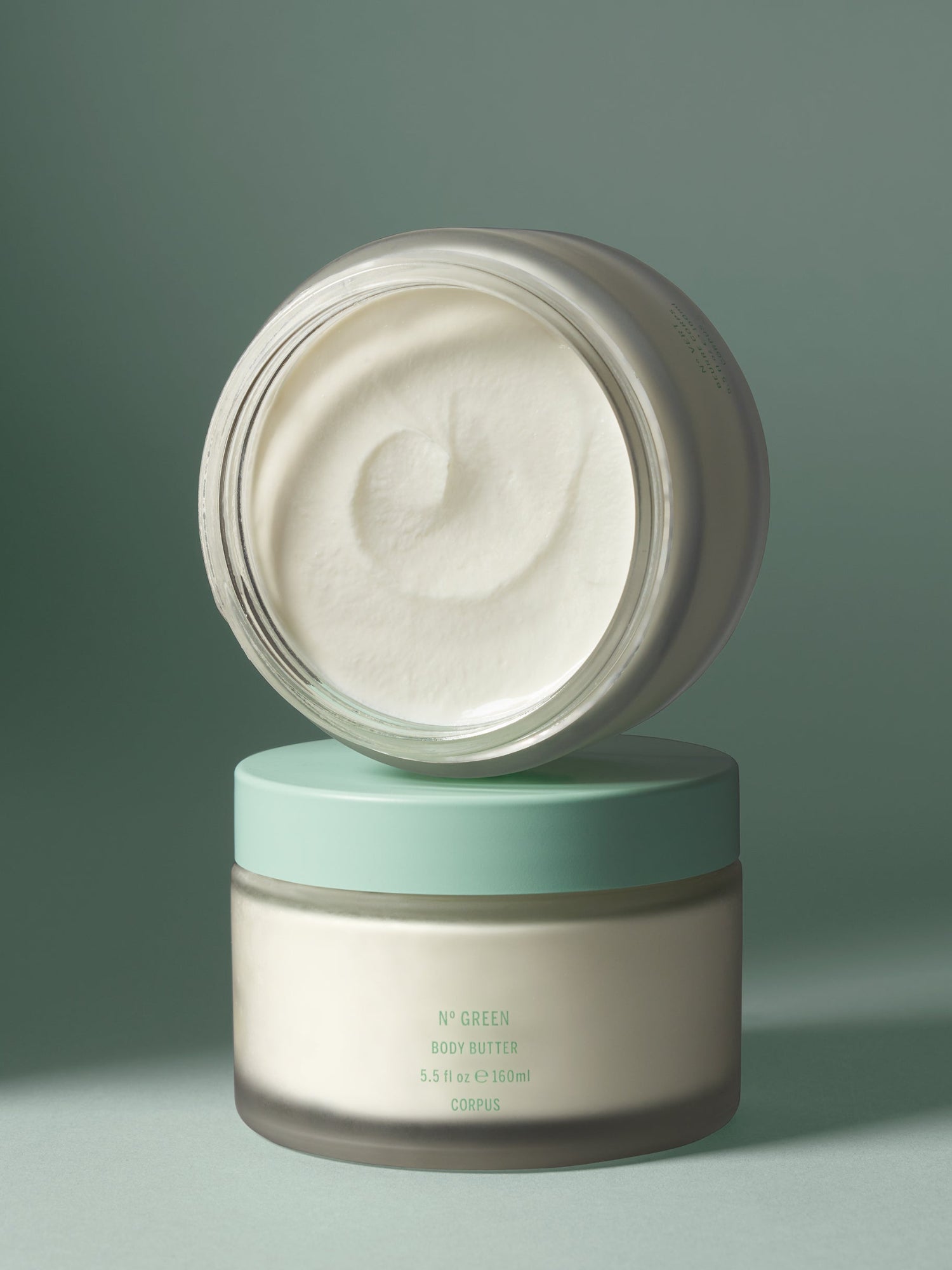 Corpus N° Green Body Butter open jar showing creamy texture