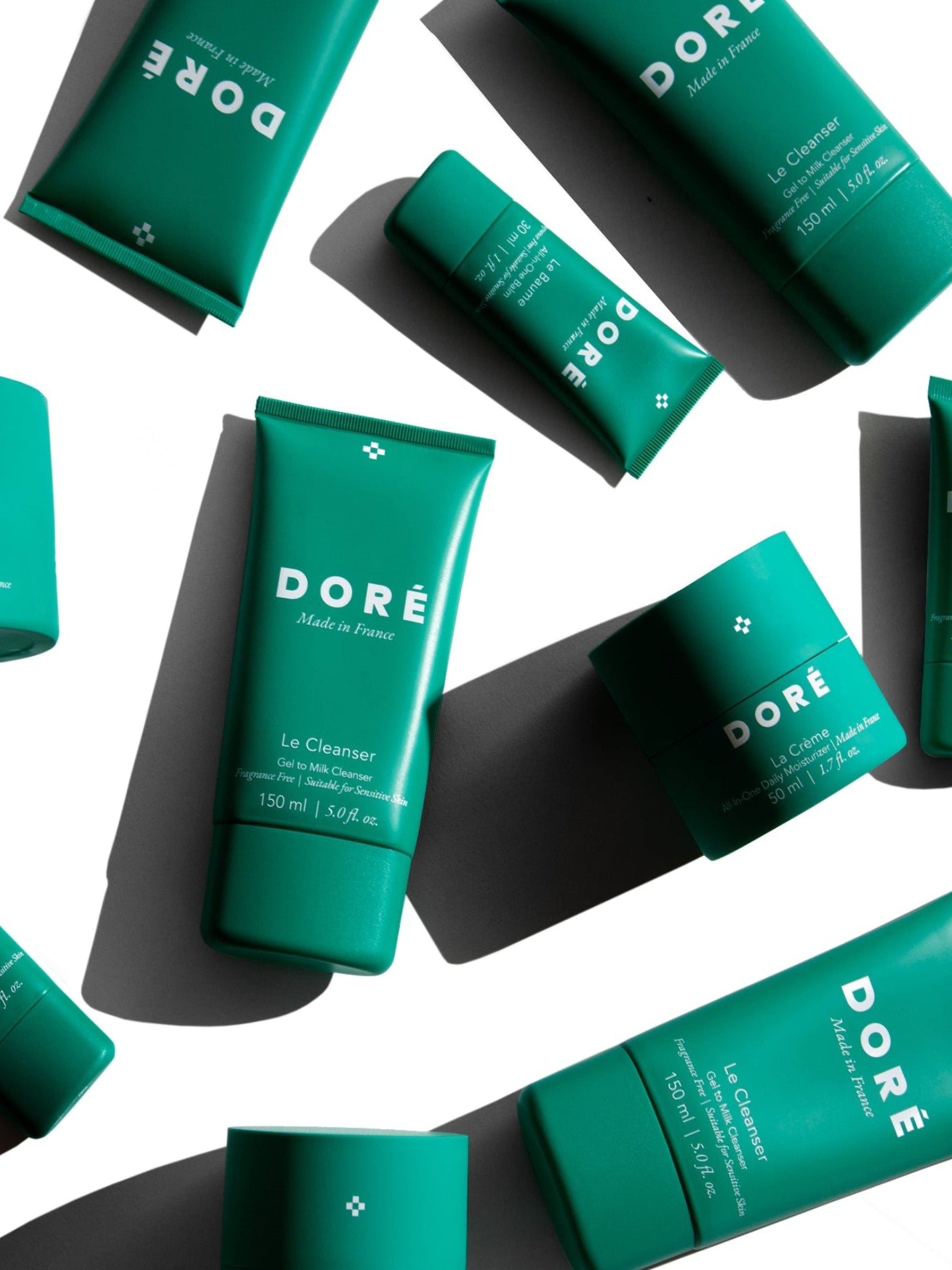 DORÉ skincare products collection including cleanser, balm and moisturizer