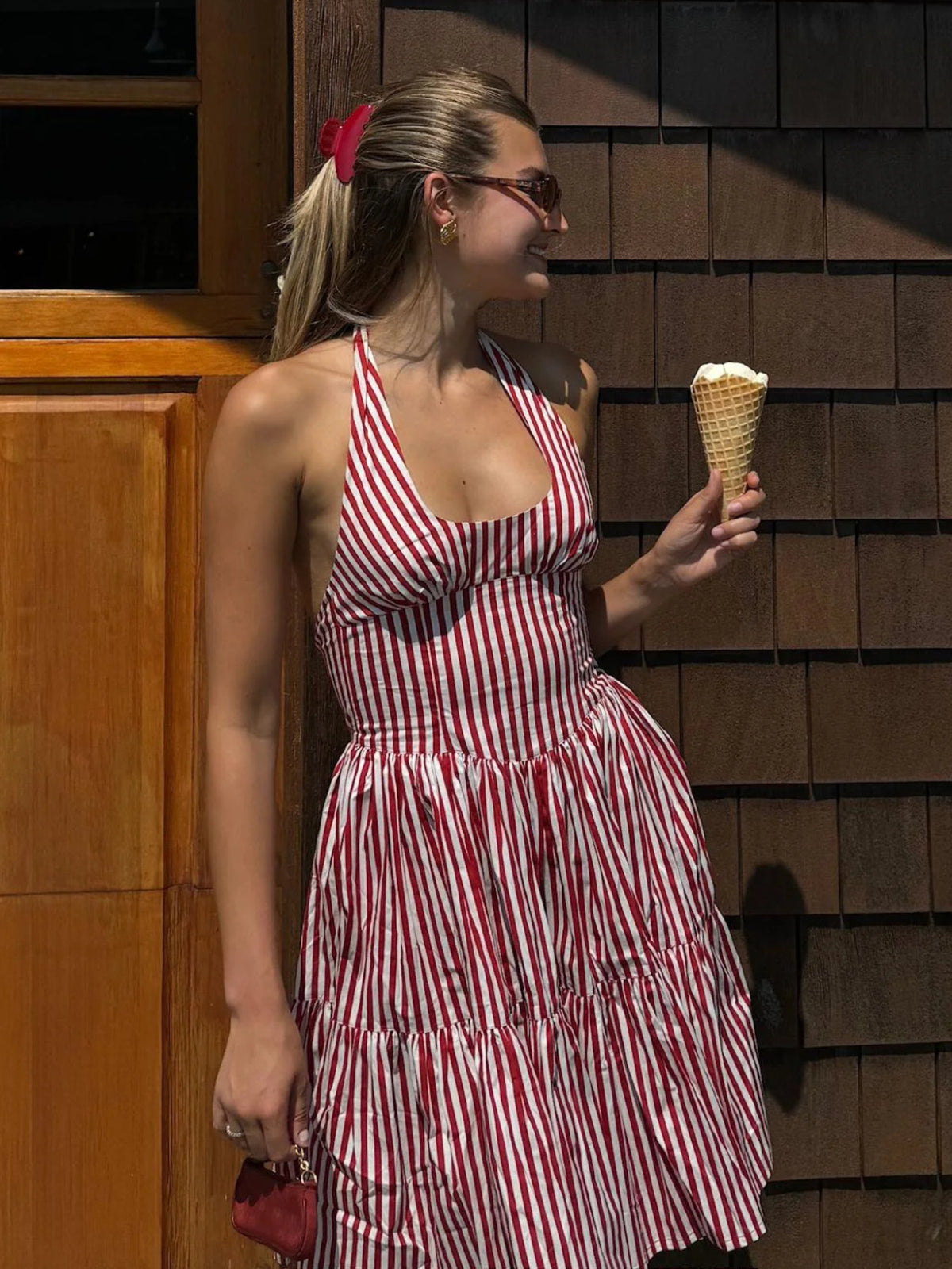 Woman wearing the Emi Jay Lil Effing Clip in Cherry Kiss