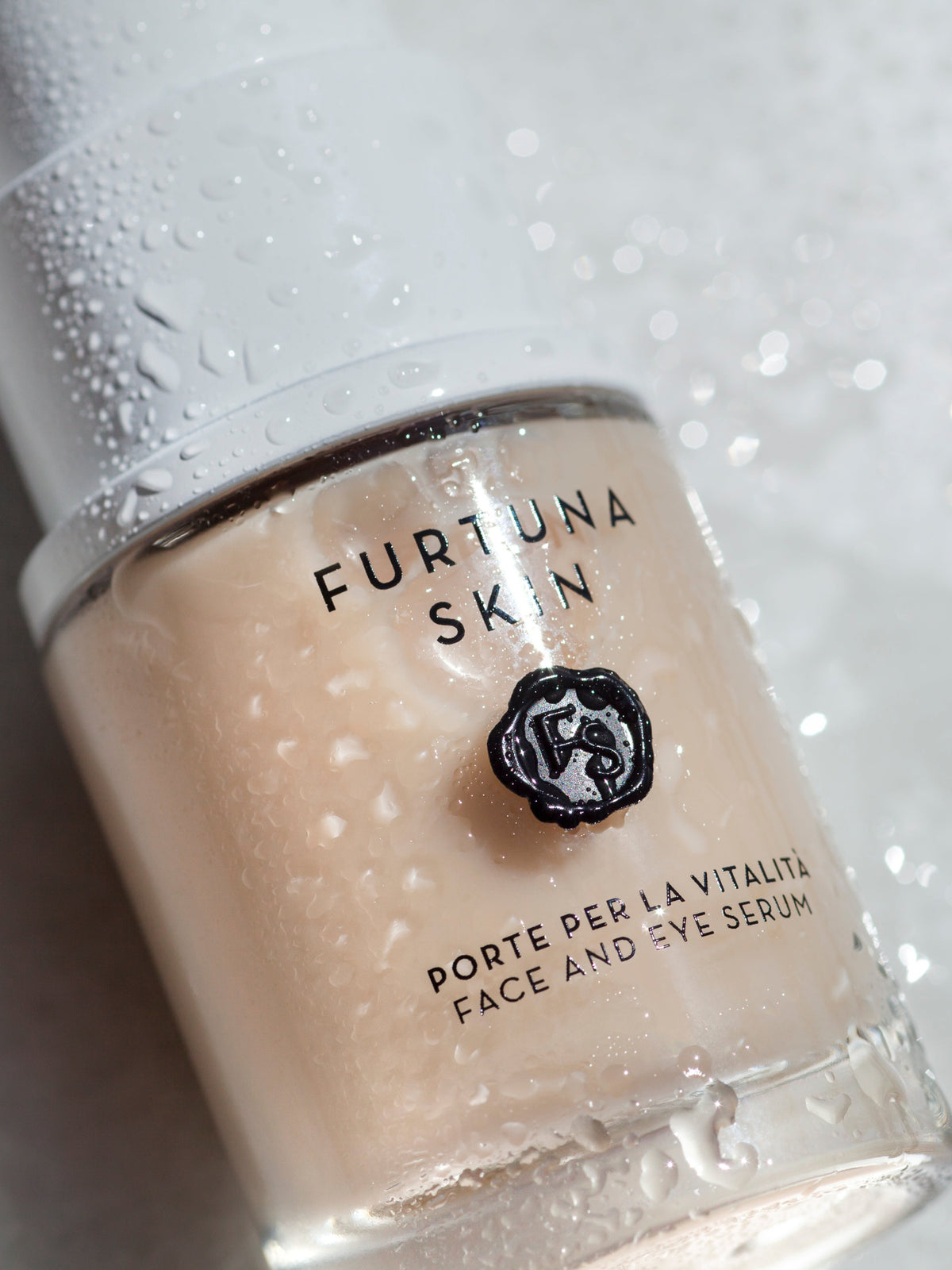 Furtuna Skin Porte Per La Vitalità Face and Eye Serum with water droplets