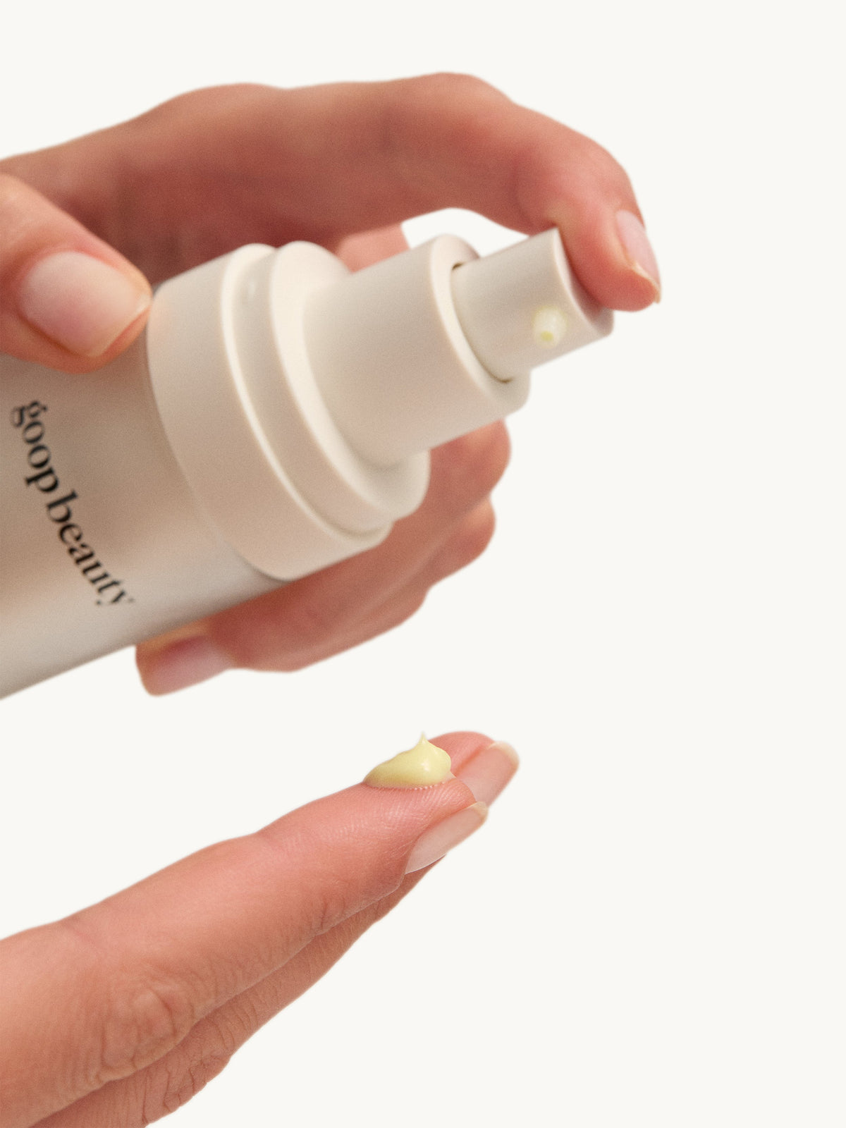 Applying goop beauty 3x Retinol Regenerative Serum