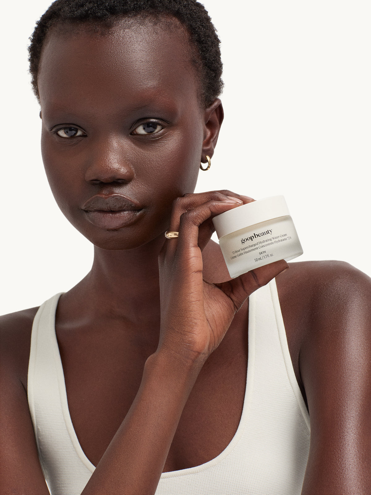 goop beauty 72-Hour Supercharged Hydrating Water-Cream held by model