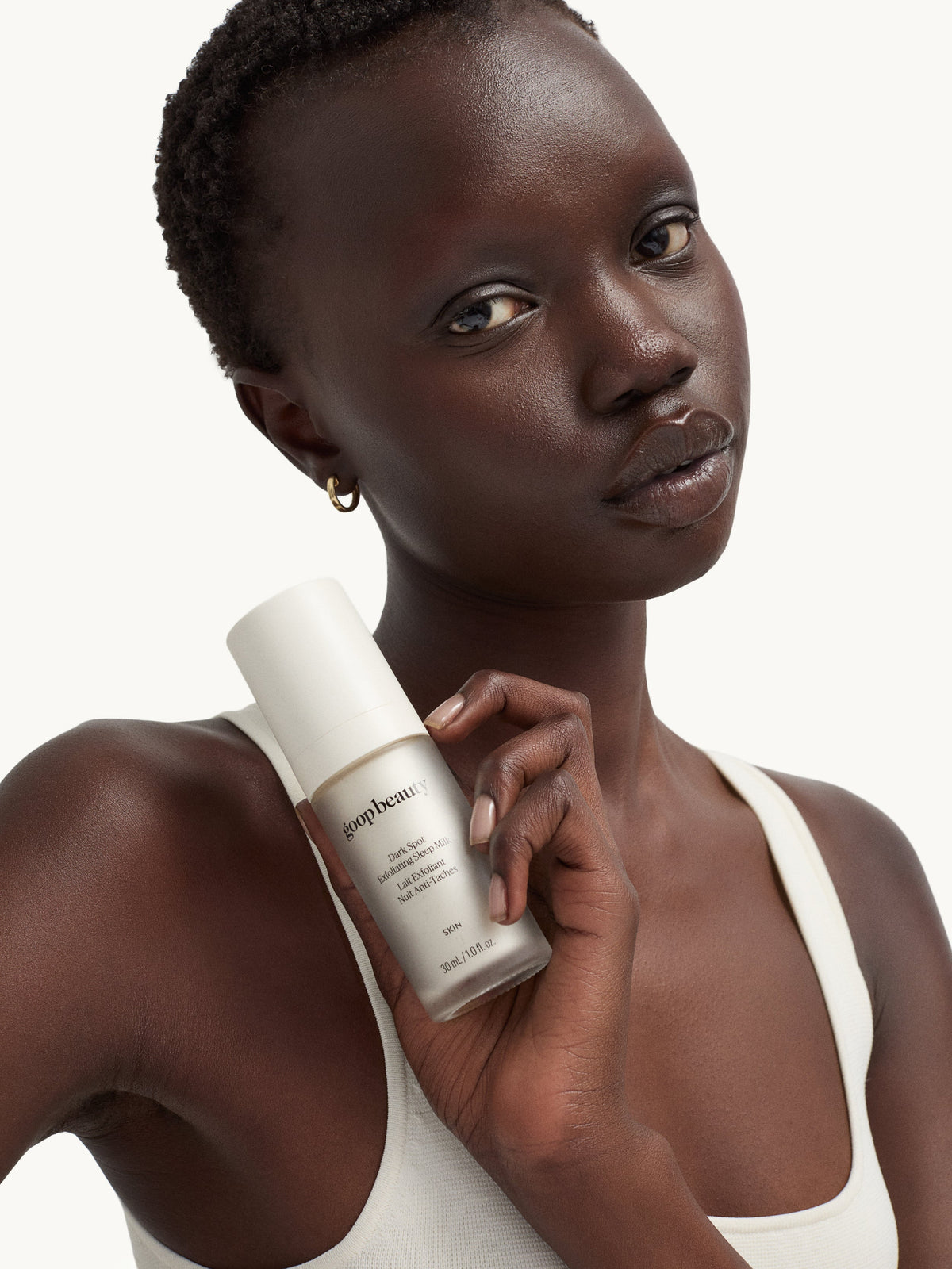 goop beauty Dark Spot Exfoliating Sleep Milk applied to skin