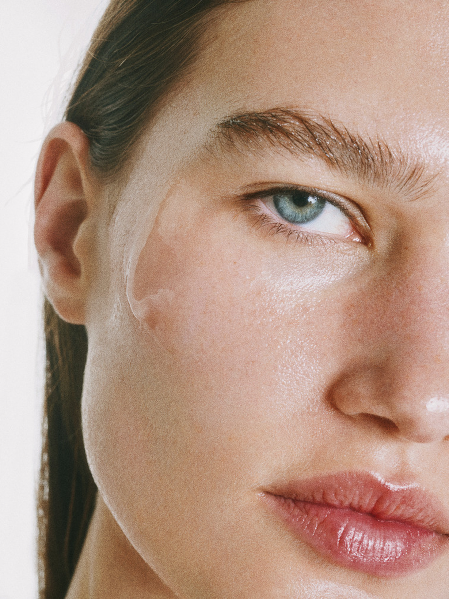 goop beauty Exosome Hydration Therapy Serum applied to skin
