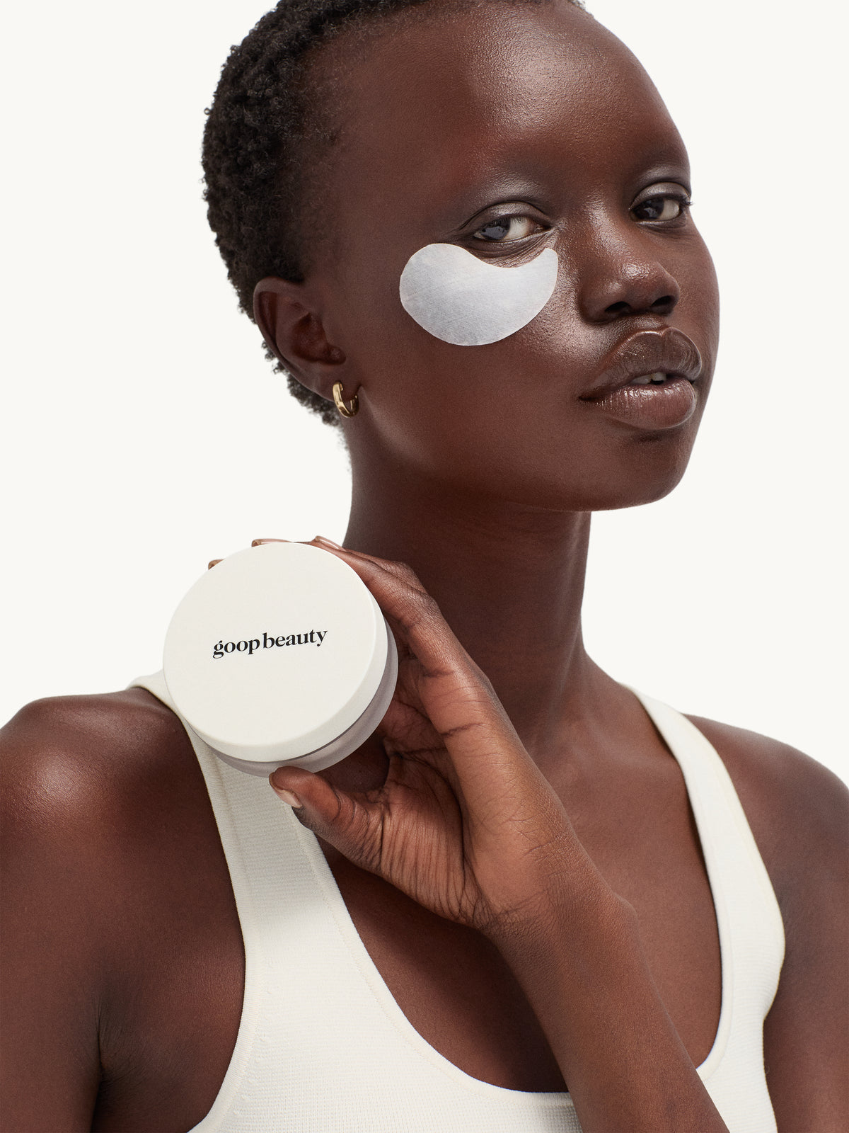 model wearing goop beauty Lift + Depuff Eye Masks