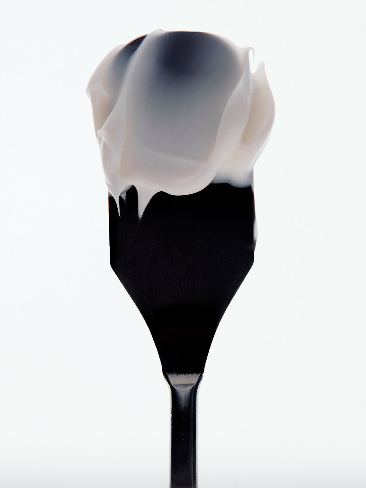 goop beauty Nourishing Repair Body Butter texture on spatula