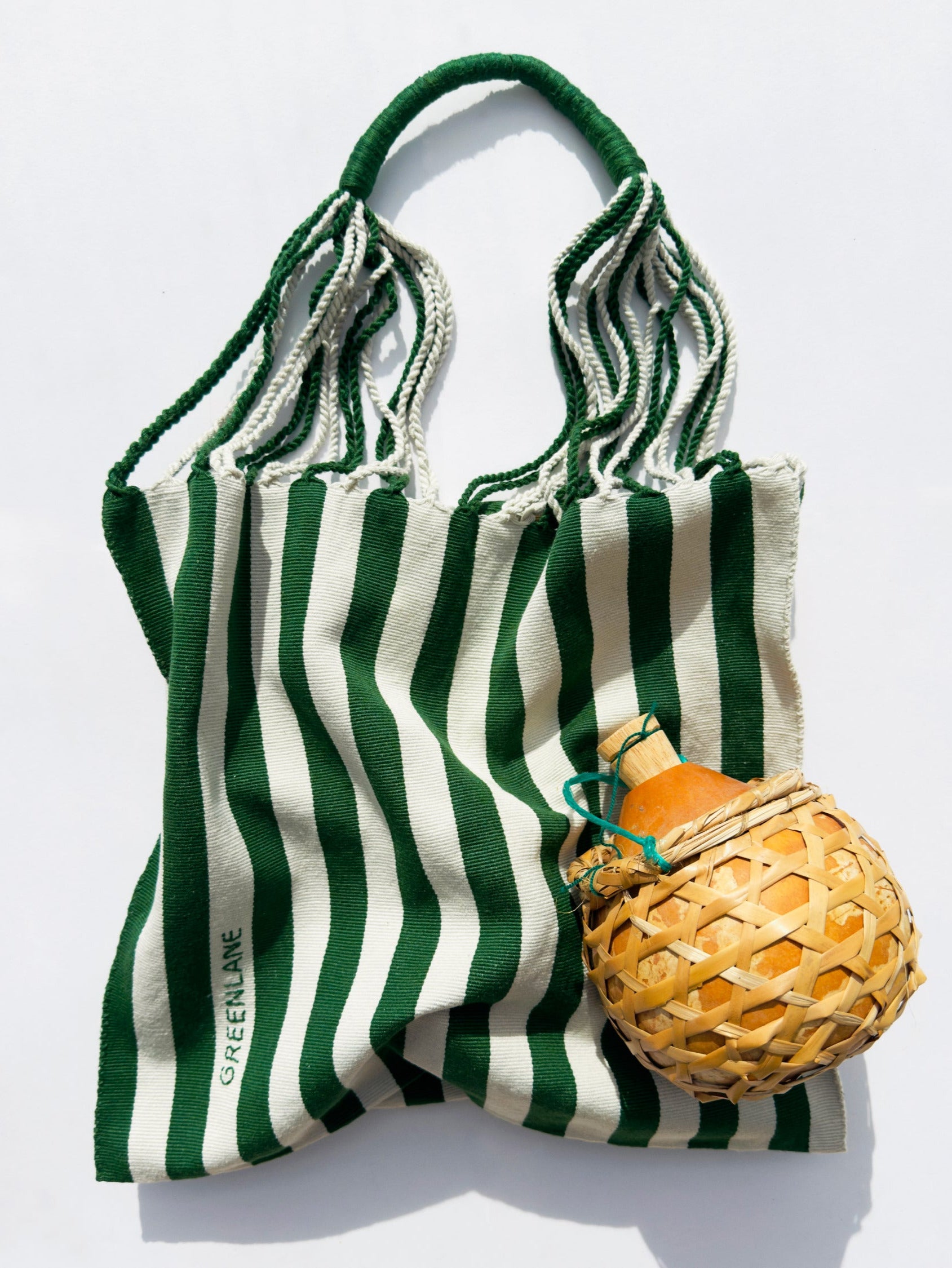 GREENLANE green and white striped tote bag for beauty and spa essentials