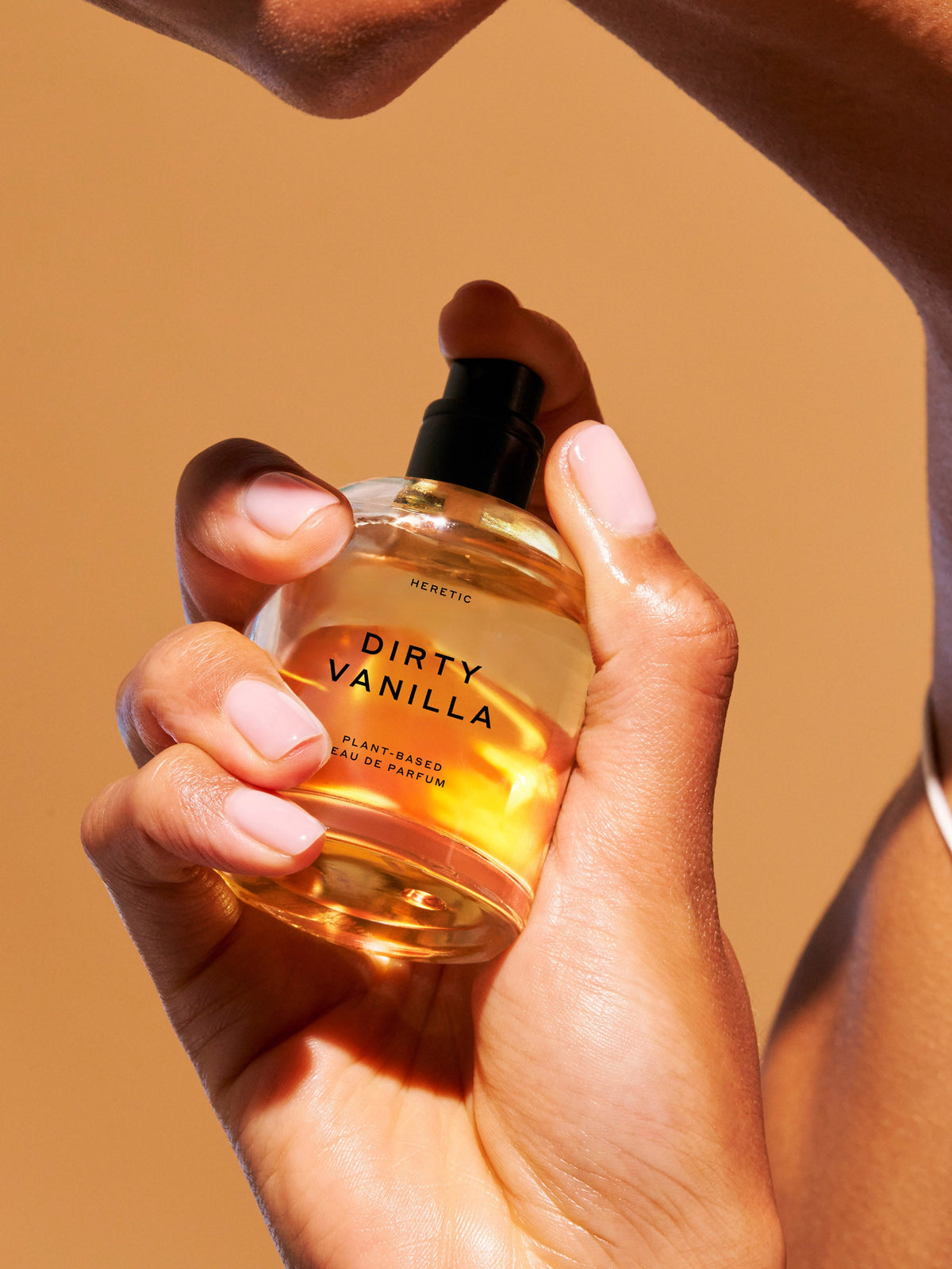 Heretic Parfum Dirty Vanilla 50ml Eau de Parfum held in hand