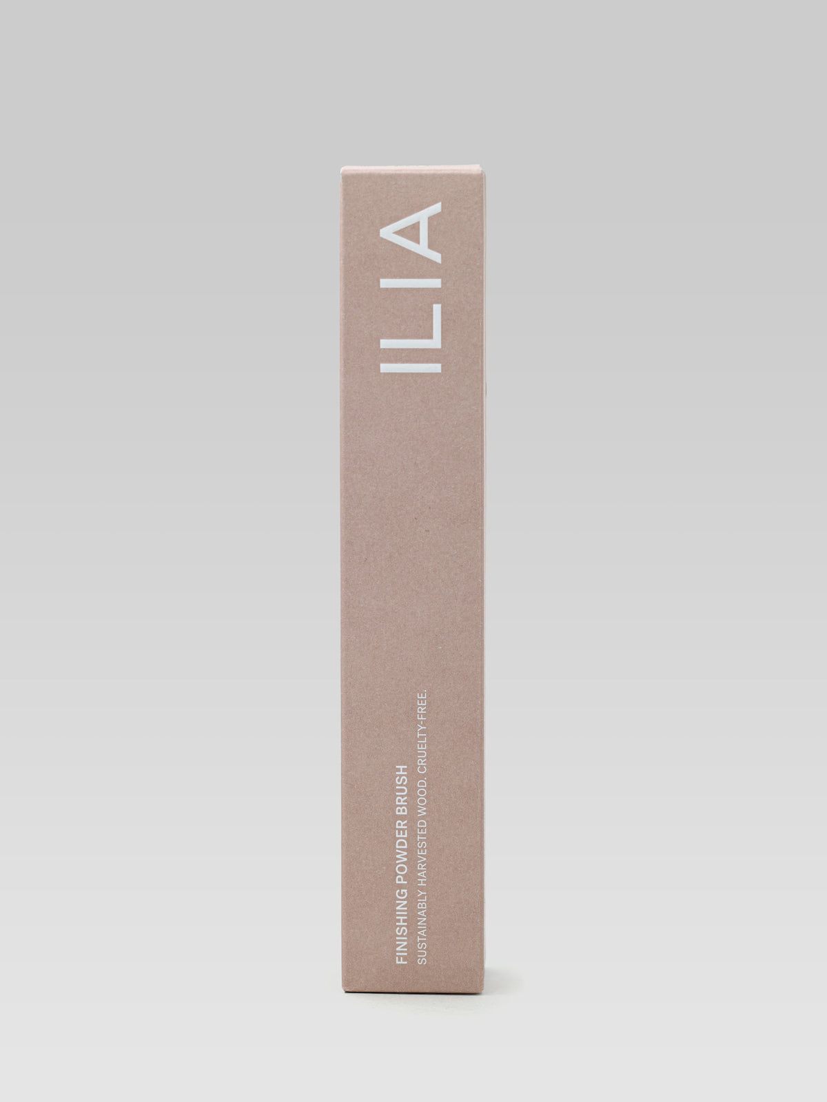 ILIA BEAUTY Finishing Powder Brush in its beige packaging box with white ILIA branding.