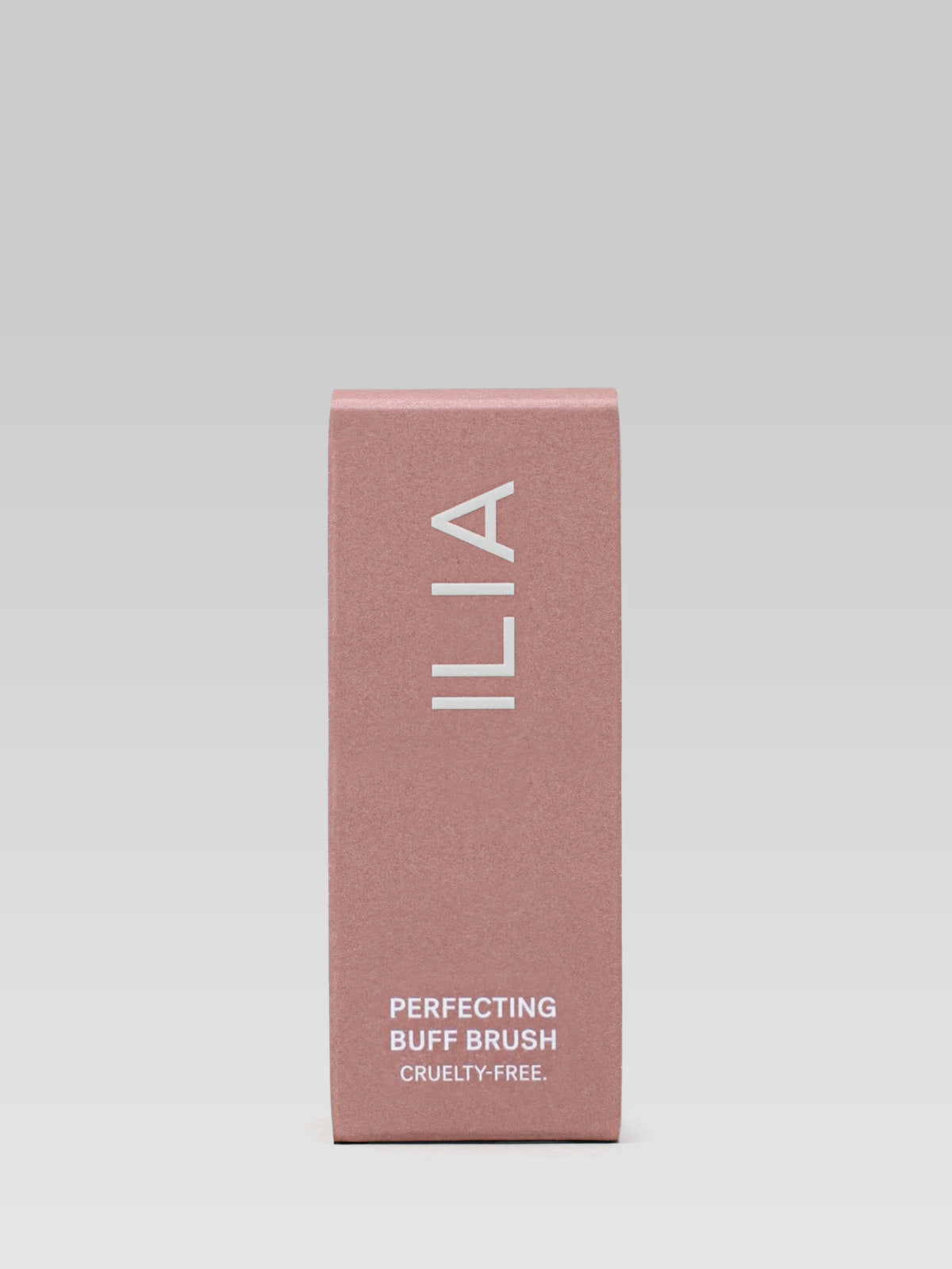 ILIA Beauty Perfecting Buff Brush packaging in a dusty pink box with white lettering