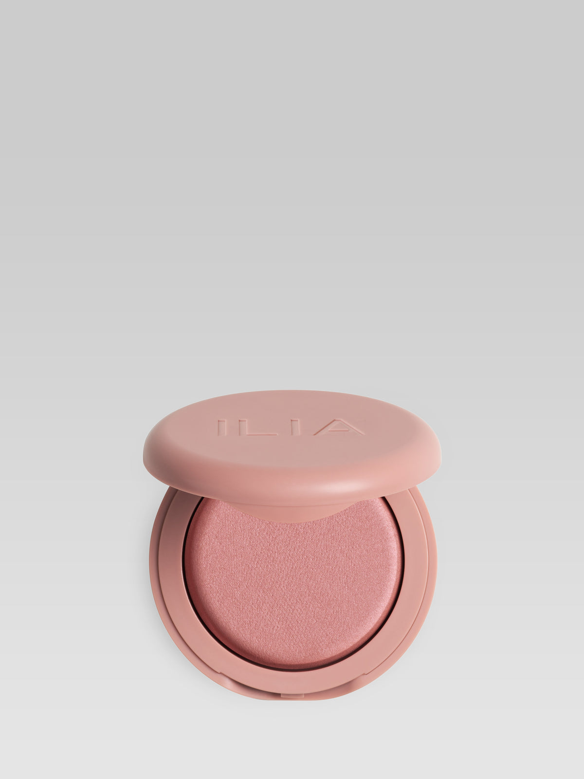 ILIA Beauty Soft Focus Blurring Blush in Glimpse, a mauve rose powder blush in a pink compact