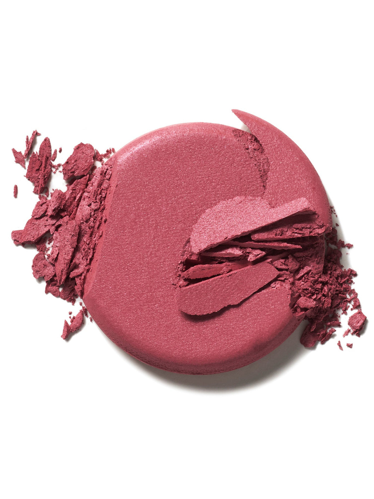 ILIA Beauty Soft Focus Blurring Blush in Sensation, a berry rose powder blush swatch with crushed pigment on a white background