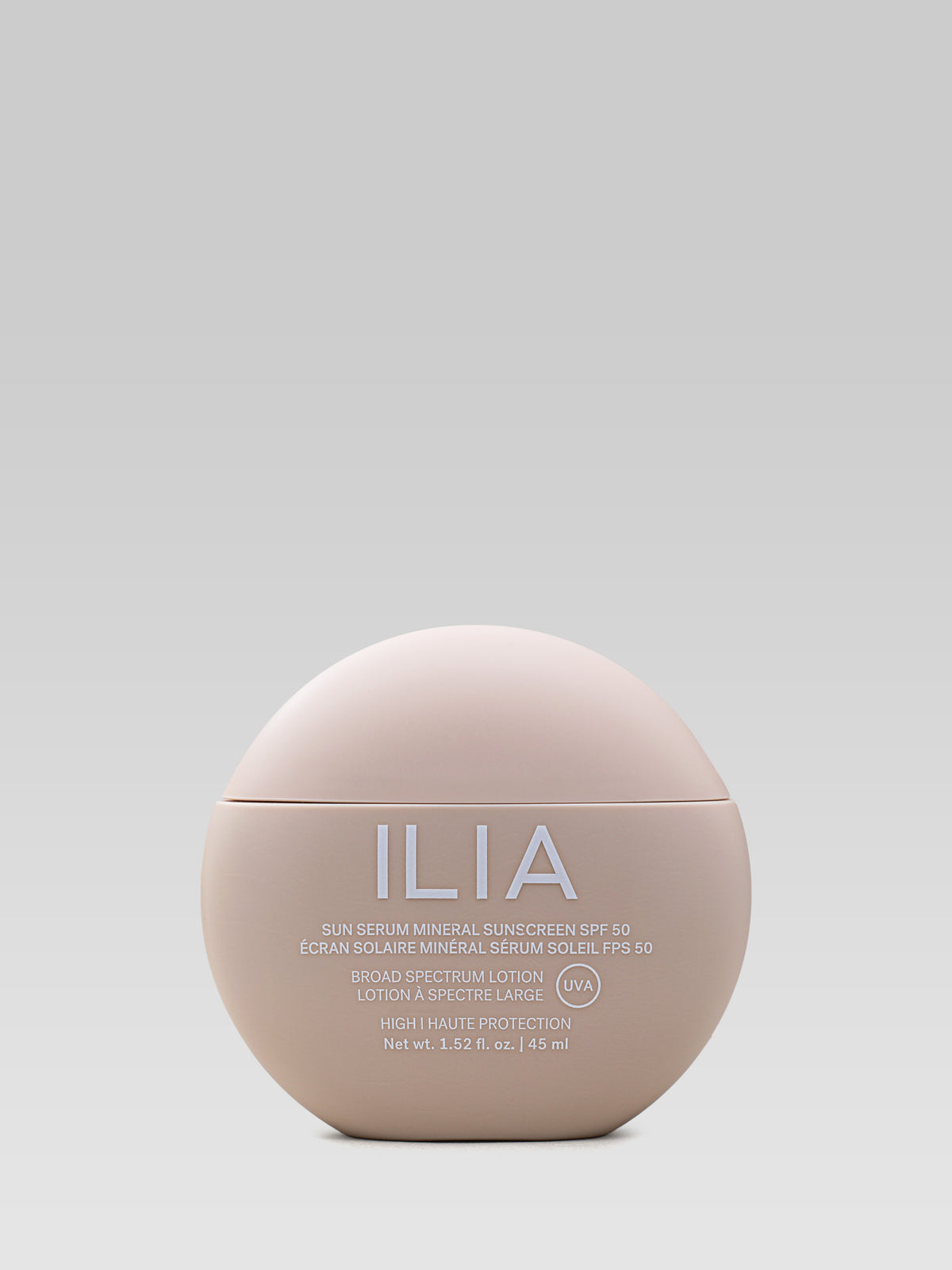 ILIA Beauty Sun Serum Mineral Sunscreen SPF 50 in a beige round compact