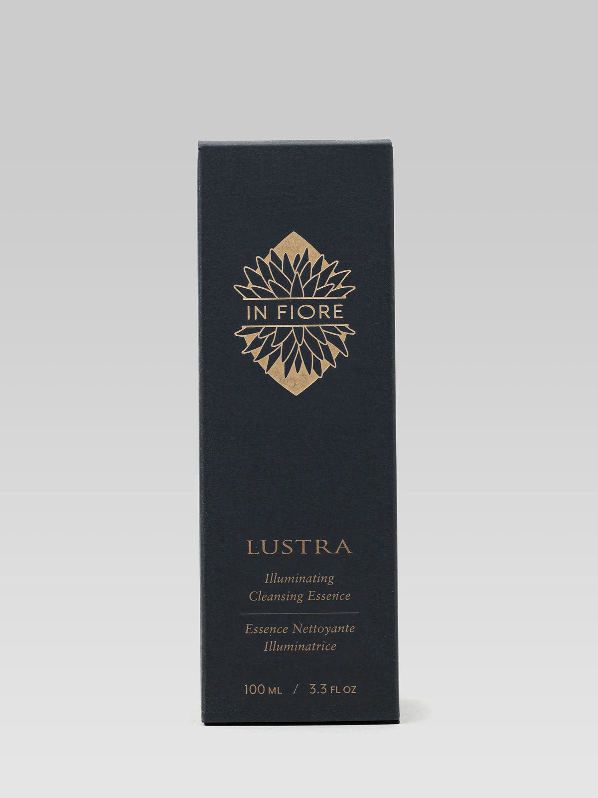 IN FIORE Lustra Illuminating Cleansing Essence black carton packaging with gold lettering on a white background