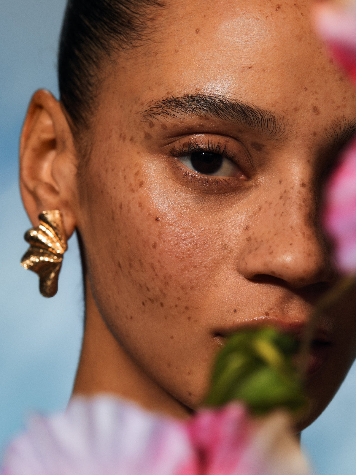 Woman with glowing skin and IRENE FORTE Prickly Pear Face Cream