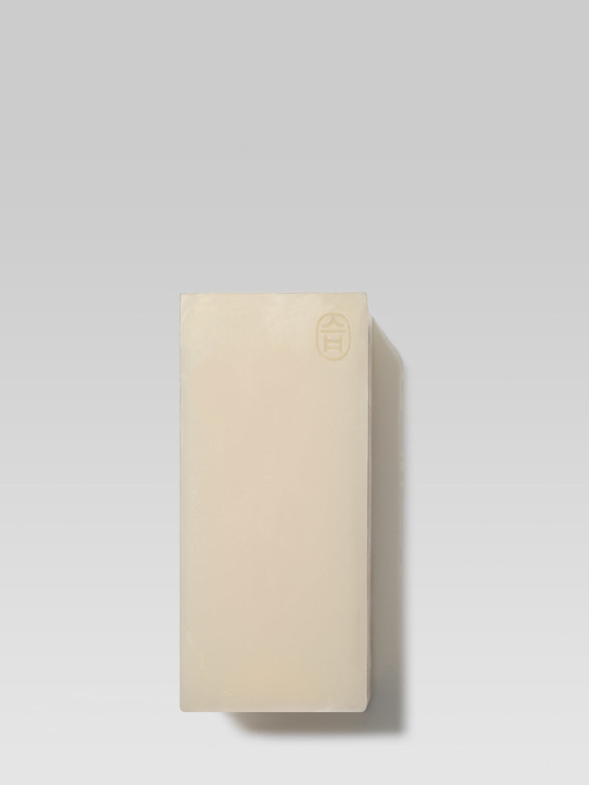 Jjimjil Ae Gi Super Mild Soap in minimalist beige packaging, photographed against a light grey background