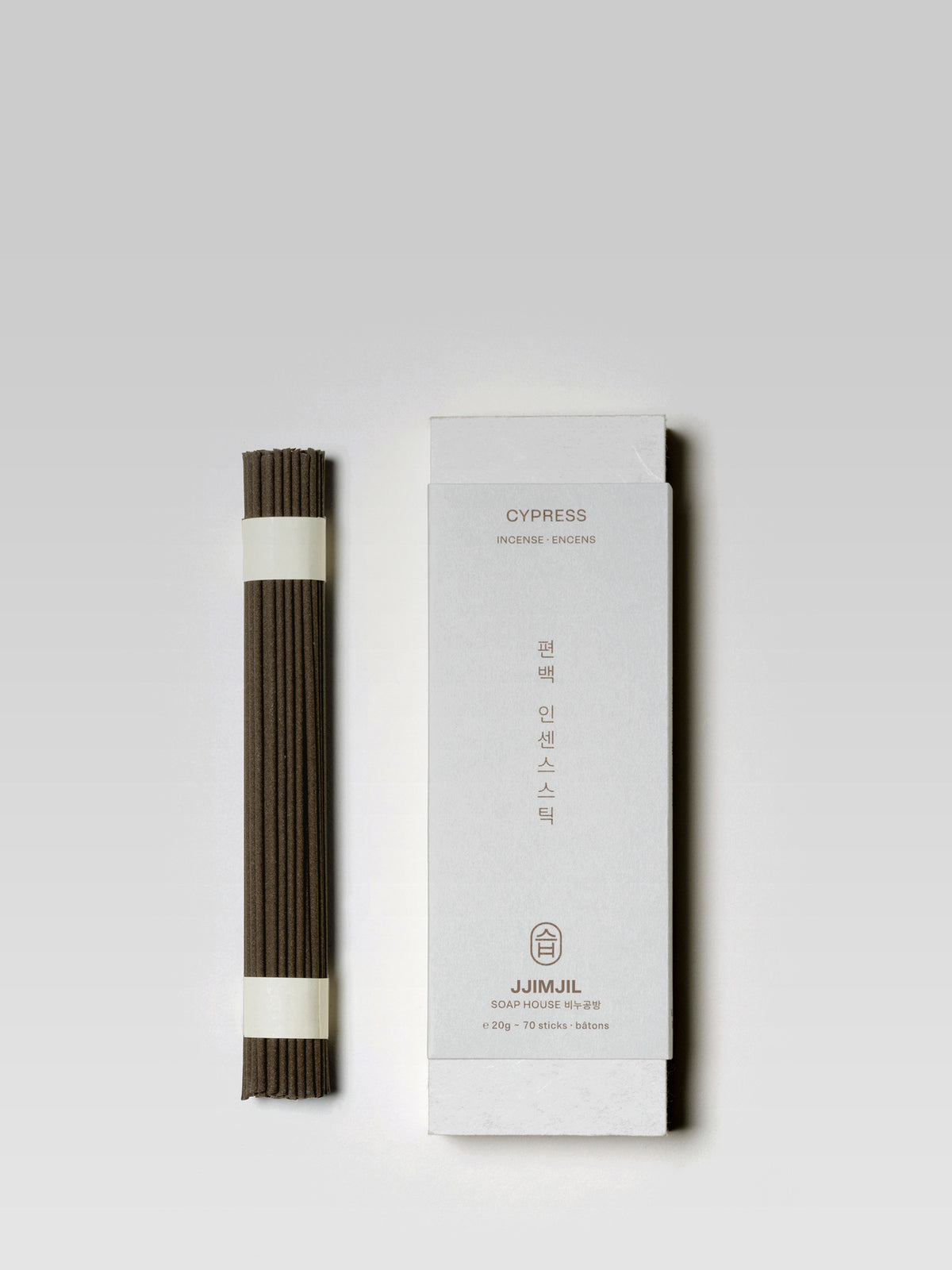 JJIMJIL Cypress Incense sticks beside the white product box with traditional Korean-inspired packaging