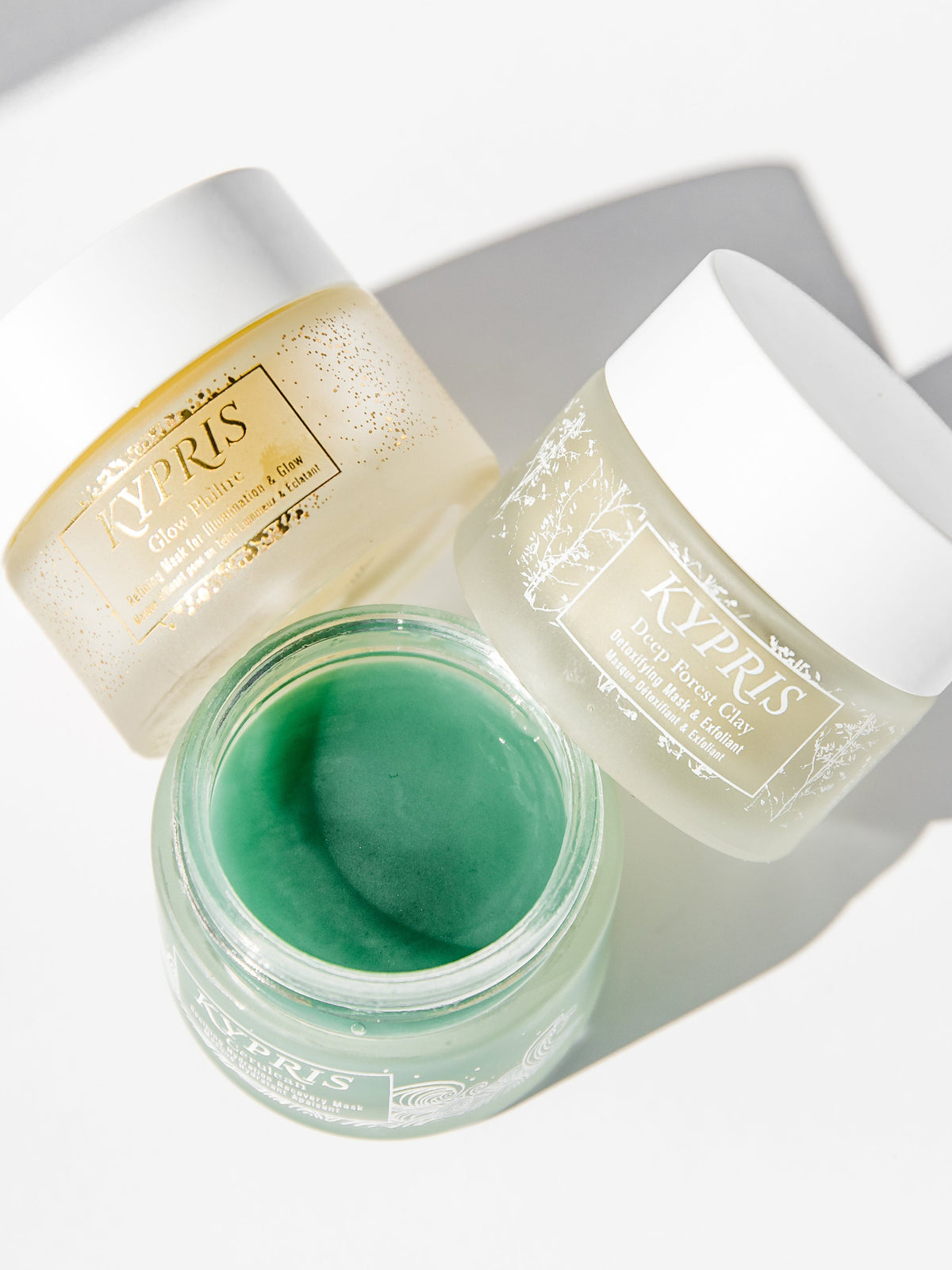 KYPRIS Cerulean Soothing Hydration Recovery Mask shown open alongside other KYPRIS skincare products