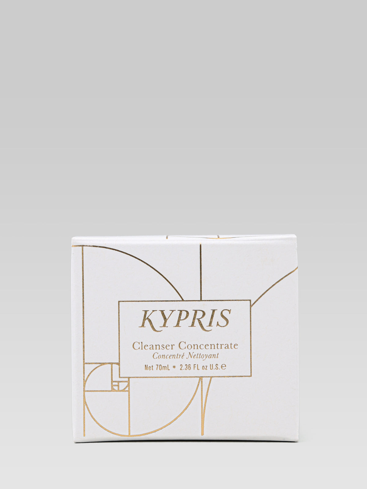 KYPRIS Cleanser Concentrate white product carton with an elegant brown geometric line design.