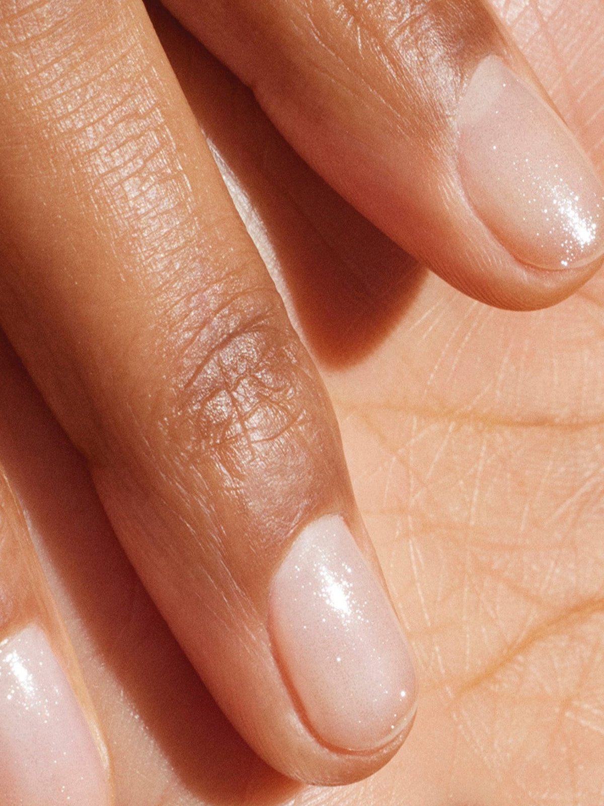 MANUCURIST Active Shine treatment on natural nails with subtle shimmer