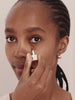 WESTMAN ATELIER Vital Skincare Concealer in Atelier D1 being applied